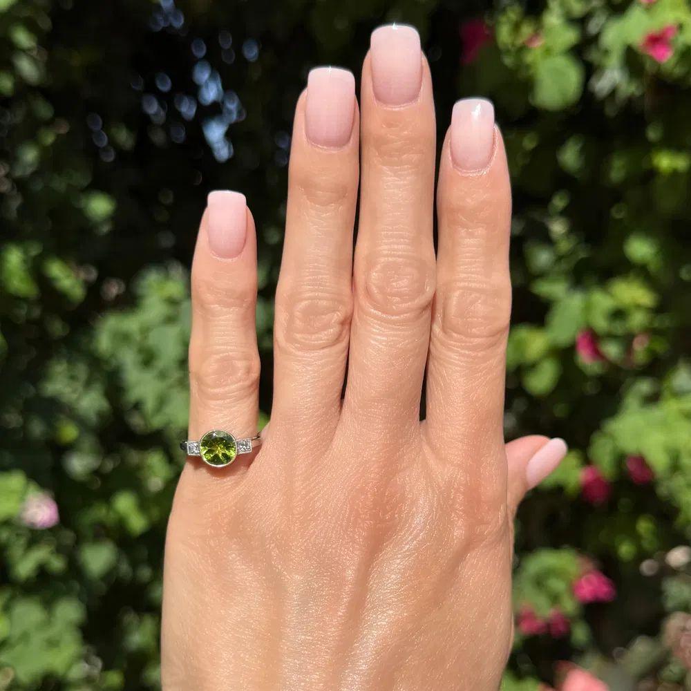 Modernist 1.93 Carat Peridot and Diamond Platinum Vintage Ring For Sale