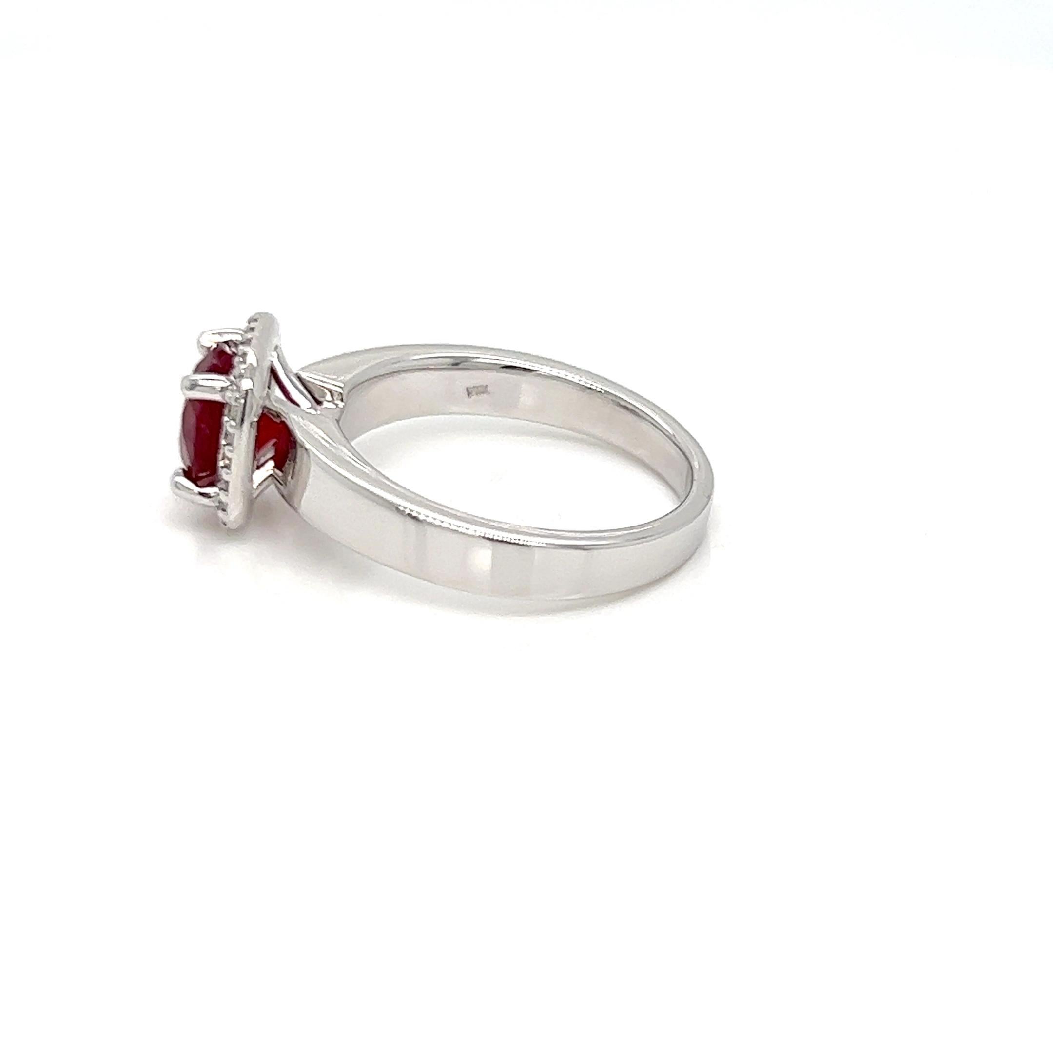 Embark the journey of everlasting love with this ring, it features a 1.93 carats of ruby and diamonds making it a halo ring and the perfect gift for that one person. The ruby is mined from Mozambique known for its beautiful pinkish red tone and the