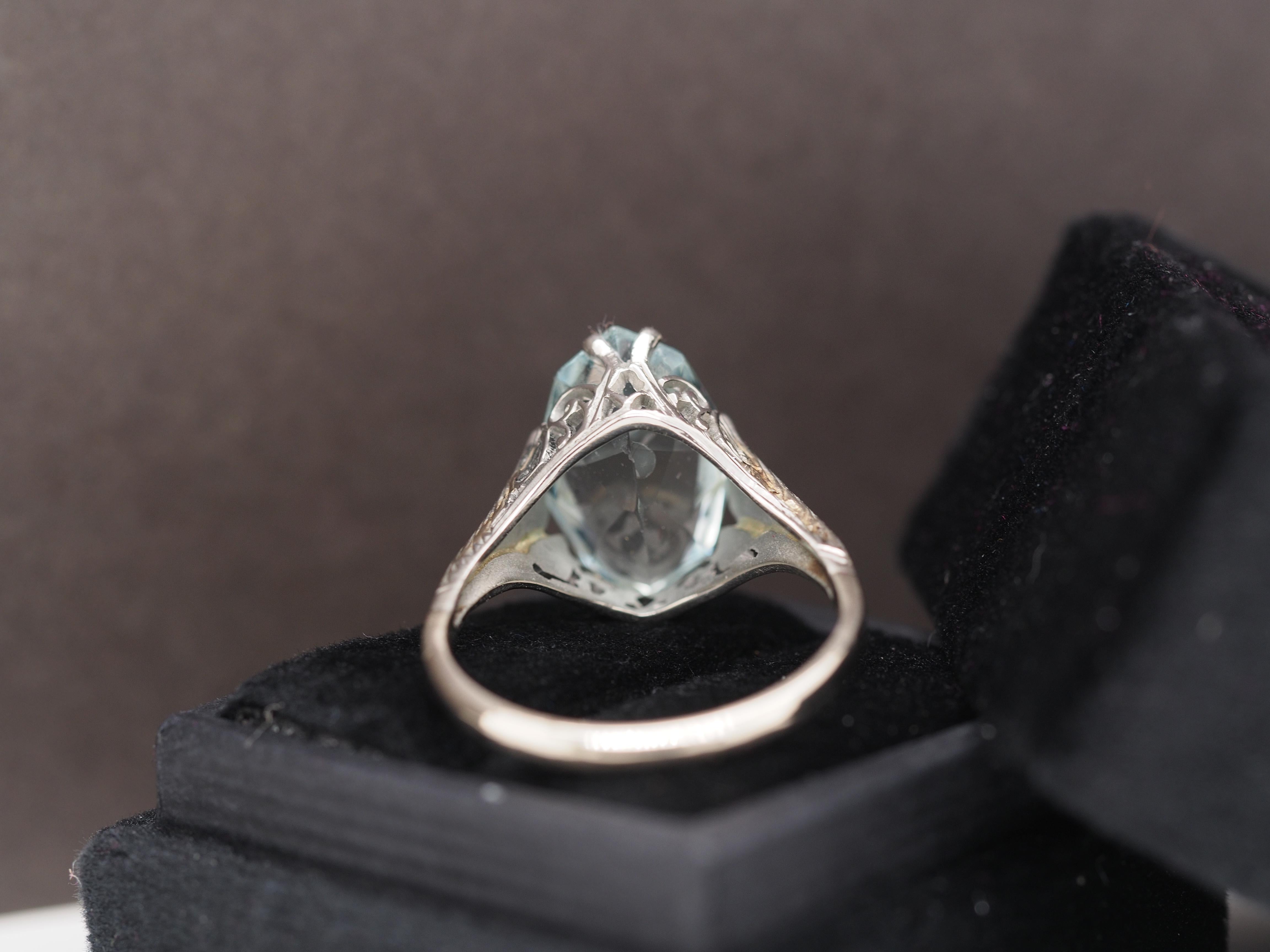Year: 1930

Item Details:
Ring Size: 8
Metal Type: 18K White Gold [Hallmarked, and Tested]
Weight: 4.3 grams

Aquamarine Details: Light Blue, 3.50ct, Marquise Shape, Natural

Band Width: 2.1 mm
Condition: Excellent

Price: $1000