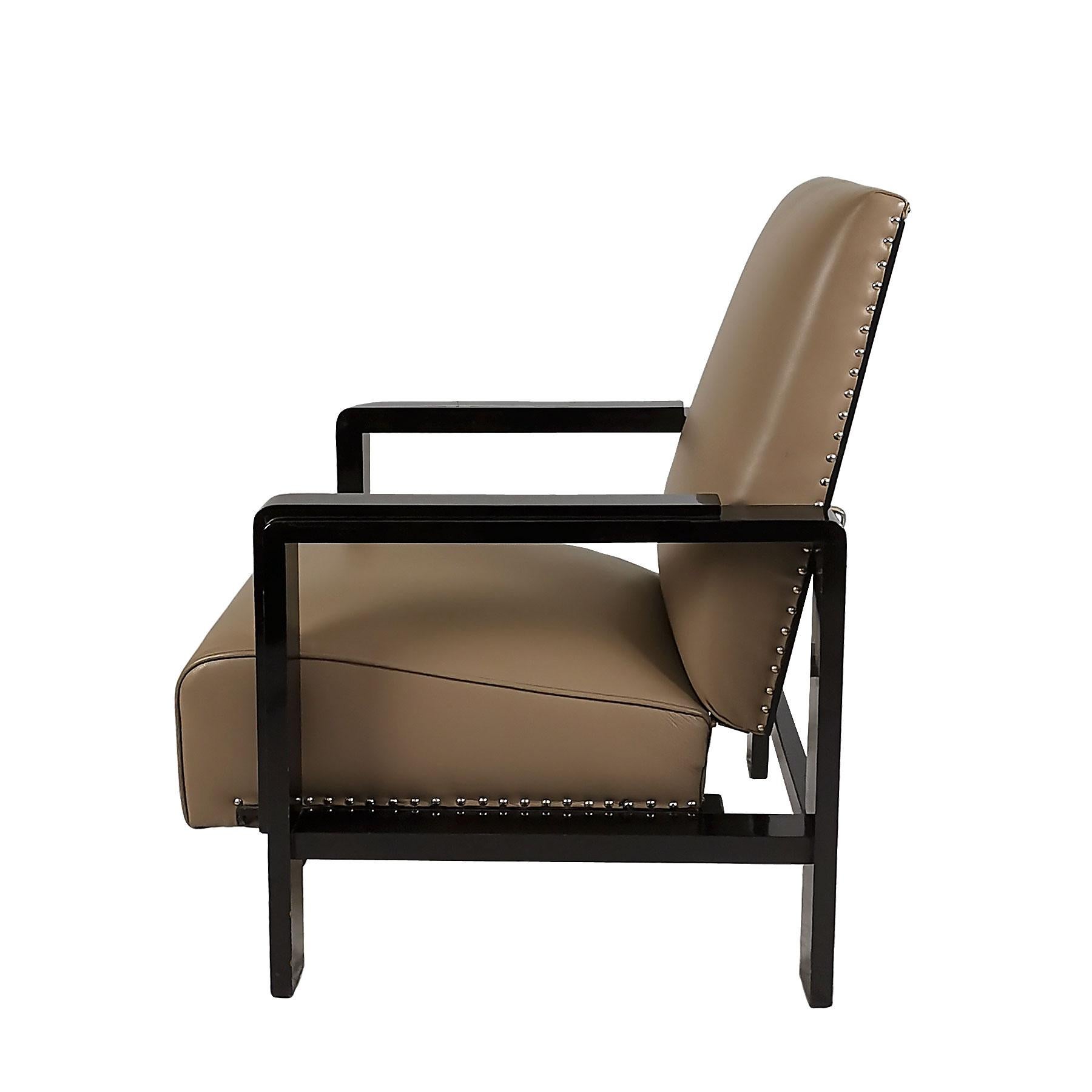 Tacheté Paire de fauteuils Art Déco 1930-1935, bois teinté et cuir - Espagne en vente