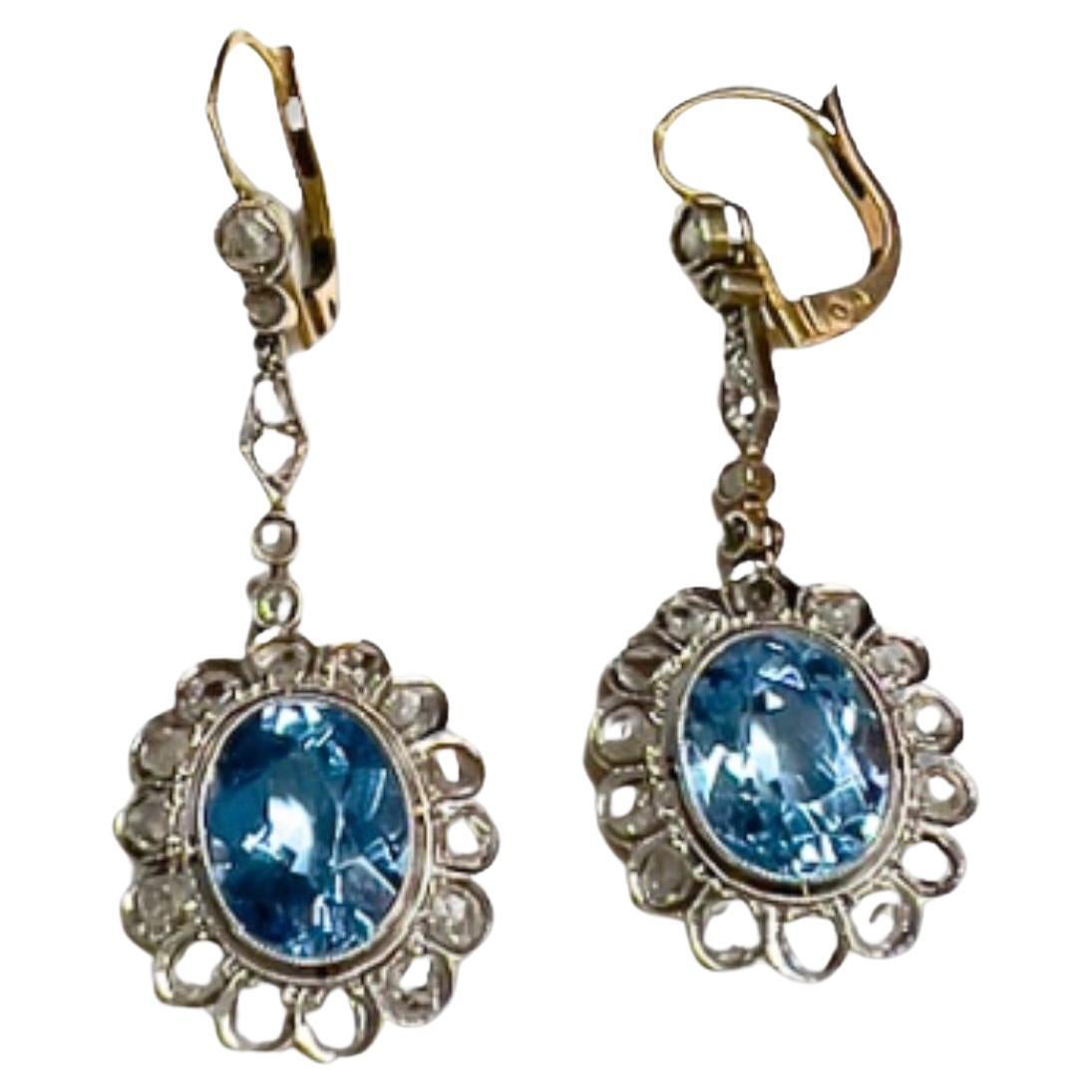 Ohrring aus Gold und Platin im Stil von 1930-1935 mit Diamanten und blauem Topas im Angebot