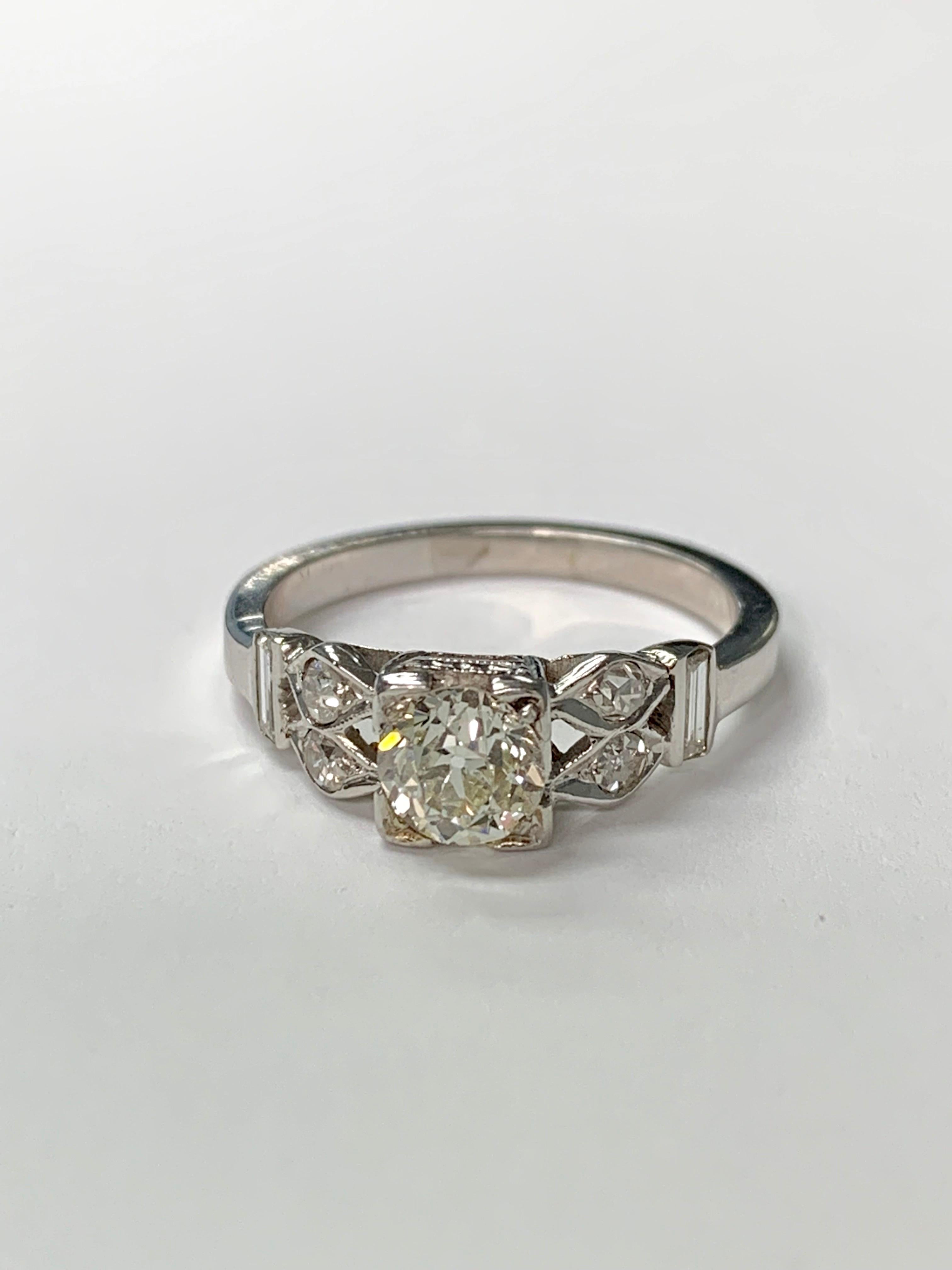 Very pretty 1930 old cut diamond engagement ring handcrafted in 118k white gold. 
The details are as follows : 
Diamond weight : 1.35 carat ( I J color VS2 clarity ) 
Metal : 18 karat white gold 
