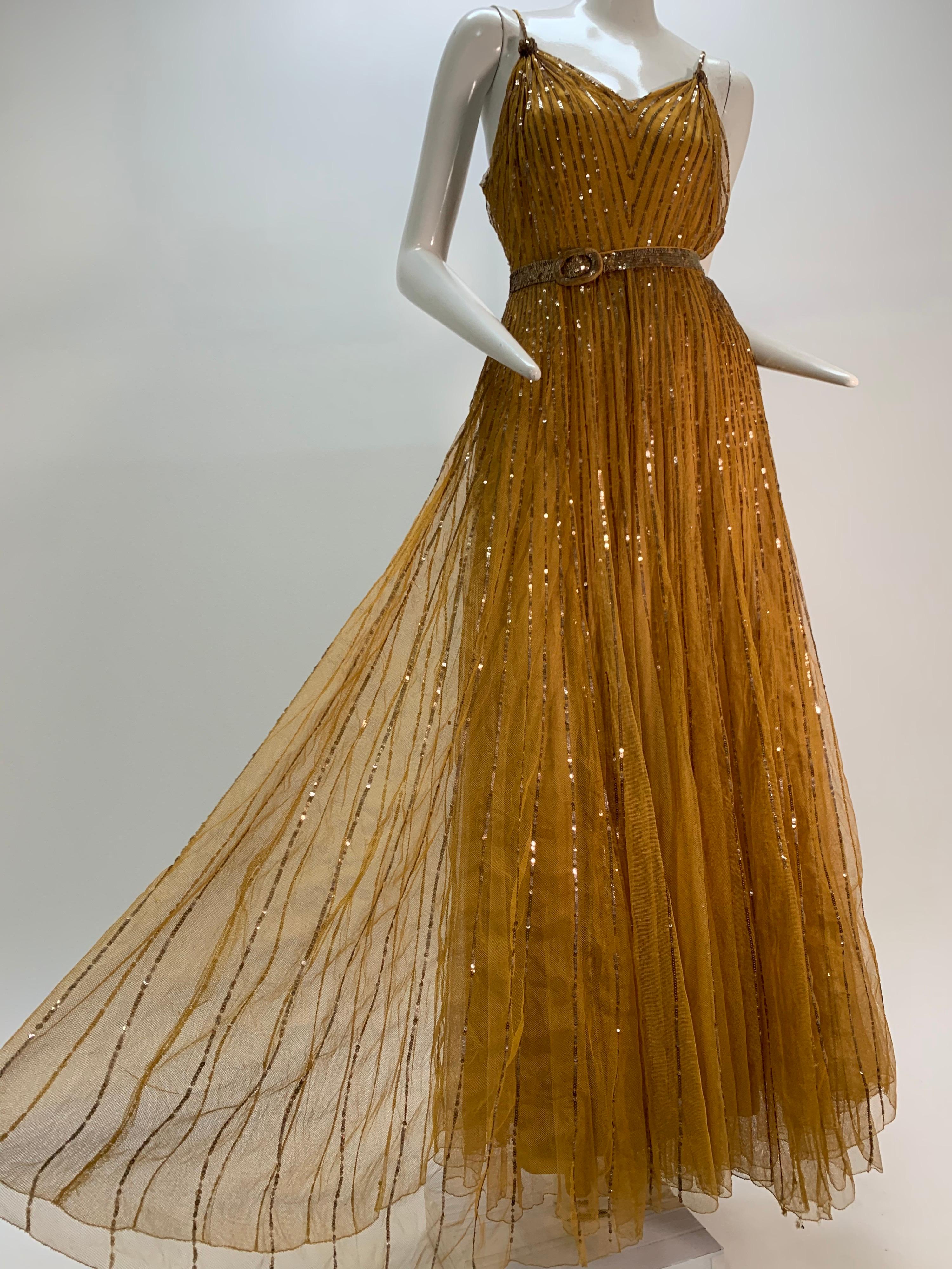 A divine 1930s Hollywood Starlet Gown: Spaghetti straps, gathered bust radiates down to the hem in golden sequined rays on gold silk tulle netting!  Gold satin lining fabric, side snaps and narrow, original, sequined belt included.  Unmarked as to
