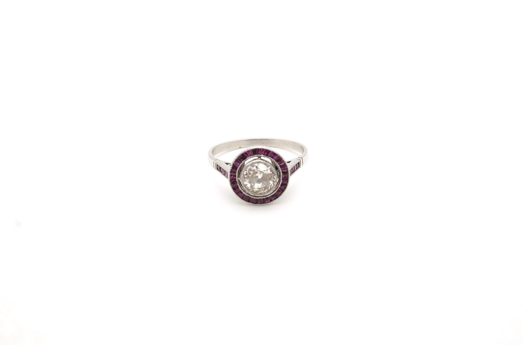 Stones: Old cut diamond
for a total weight of 0.65 carat and calibrated rubies.
Material: Platinum
Dimensions: Diameter of 1.10cm
Period: 1930
Weight: 3.8g
Size: 57 (free sizing)
Certificate
Ref. :24714