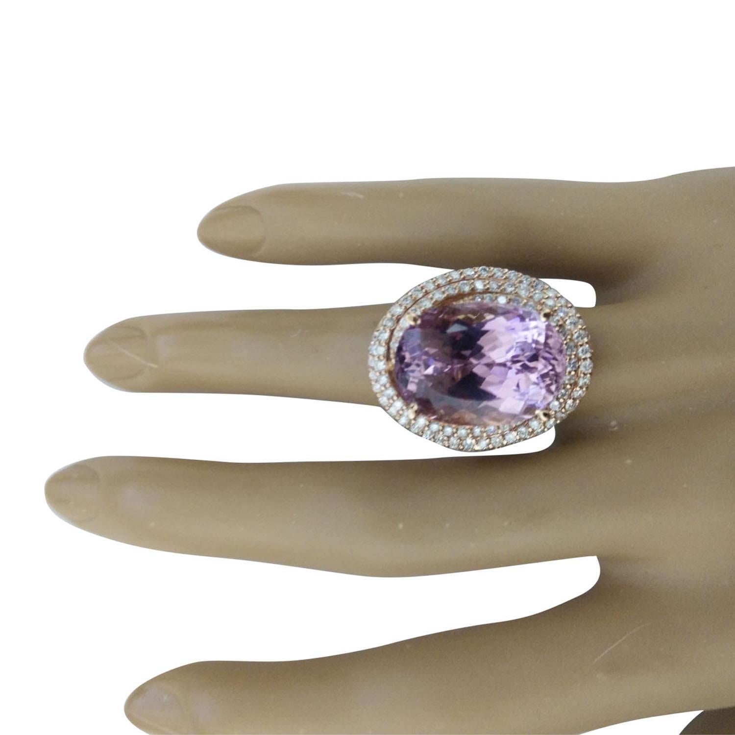 19.30 Carat Natural Kunzite 14 Karat Solid Rose Gold Diamond Ring
Stamped: 14K 
Ring Size: 7 
Total Ring Weight: 9.4 Grams
Kunzite Weight: 18.50 Carat (18.00x13.00 Millimeter) 
Diamond Weight: 1.20 Carat (F-G Color, VS2-SI1 Clarity)
Face Measures: