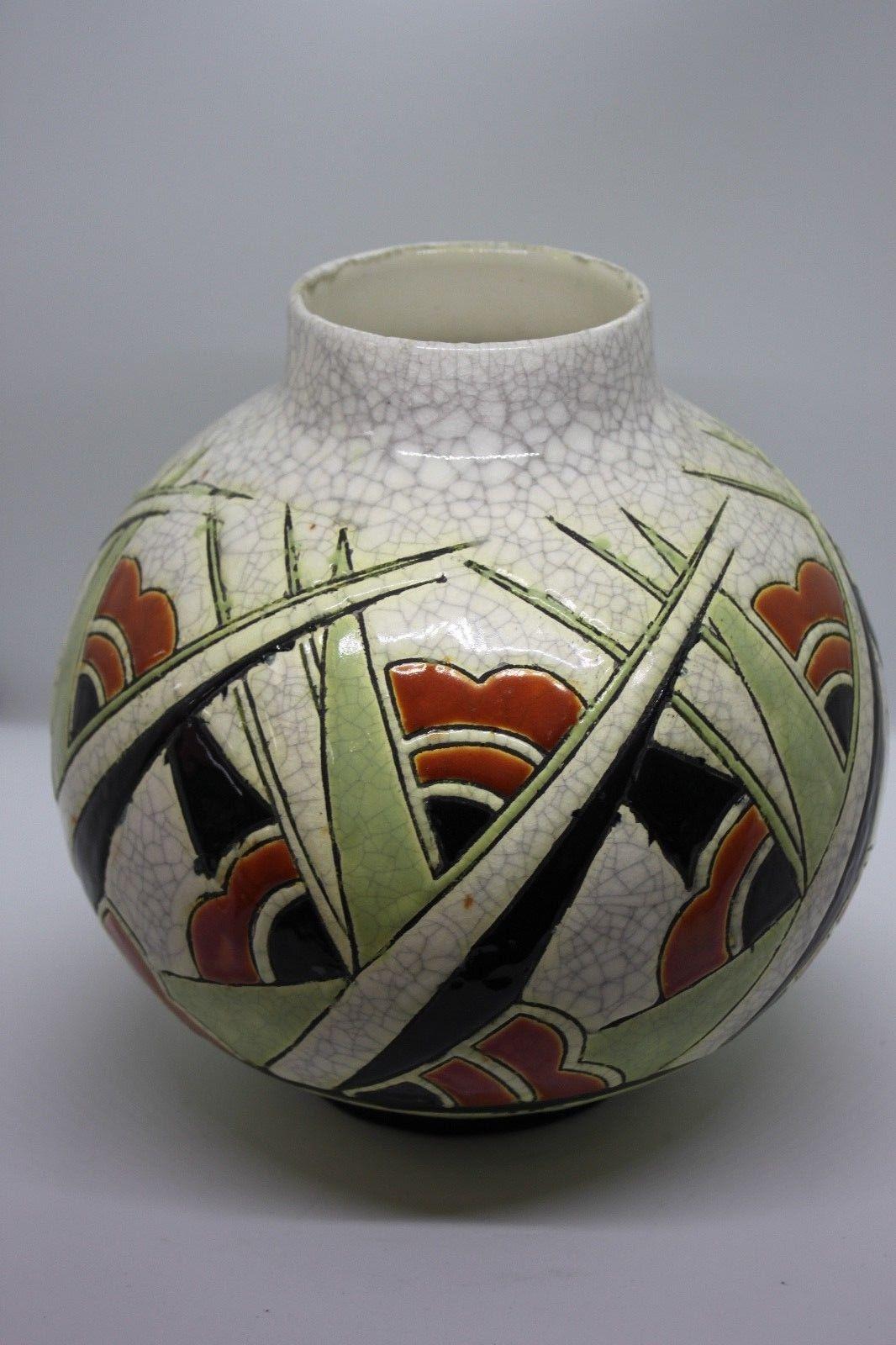 1930 vase of Catteau by Boch The louviere.
Dimensions: Height 25cm, diameter 22cm.