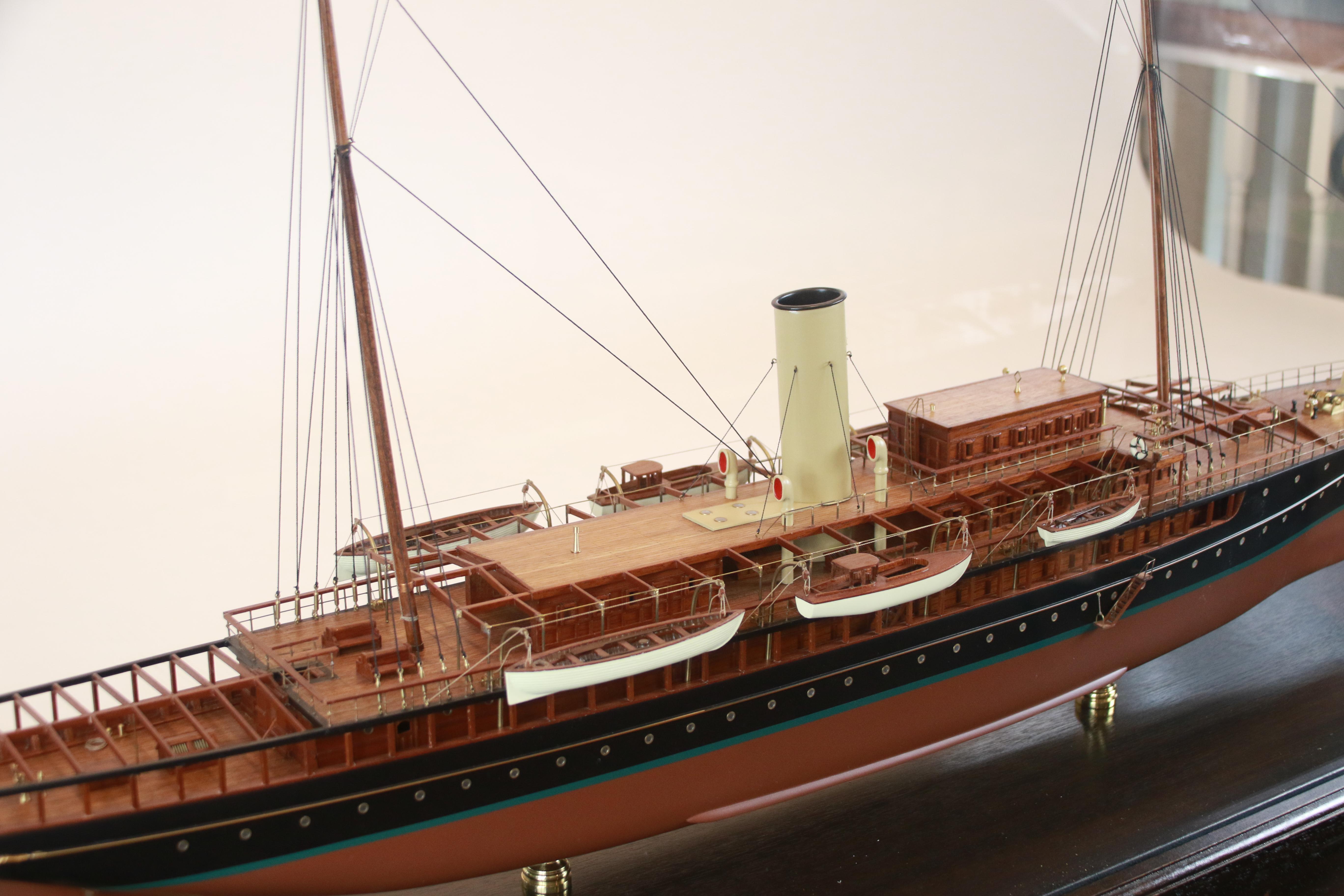The Corsair IV of 1930 was a private steam yacht owned by J. Pierpont Morgan, jr. The model is mounted into a glass and brass display case and has numerous details including lifeboats hanging from davits, funnels, cabins, portholes, doors, ladders,
