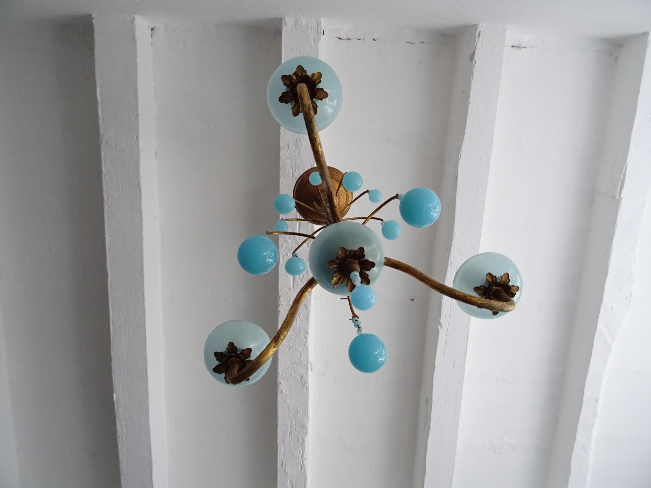 Housing 3-light sitting in blue opaline bobeches. Will be rewired with certified UL US sockets or appropriate sockets for other countries and ready to hang. Gilt metal. Murano blue opaline drops in three sizes and beads. Another blue bobeche on