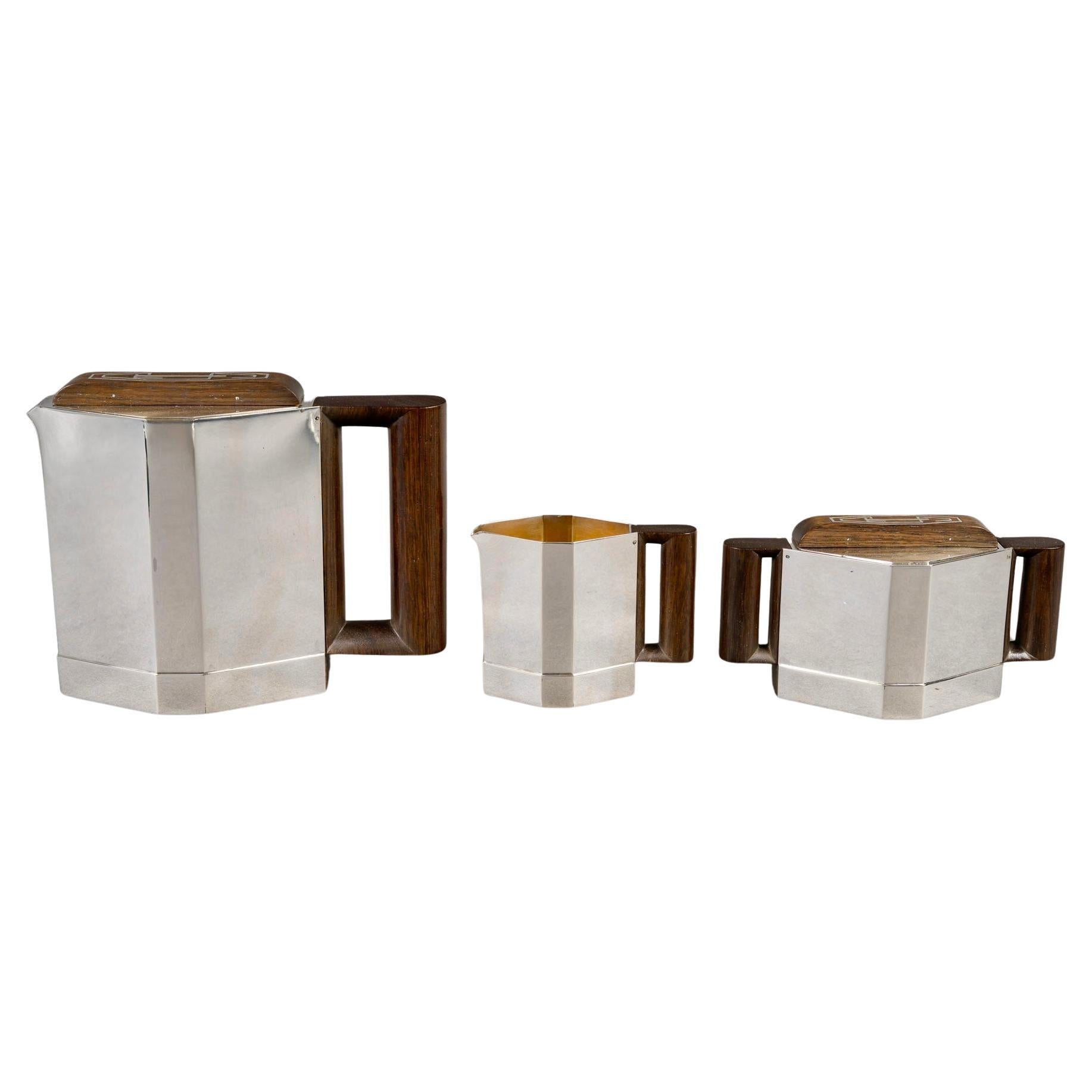 1930 Jean E Puiforcat Juego de café y té modernista Art Déco Plata de ley Palisandro