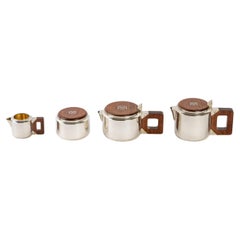 1930 Jean E. Puiforcat, Tea and Coffee Egoiste Set in Sterling Silver and Rosew