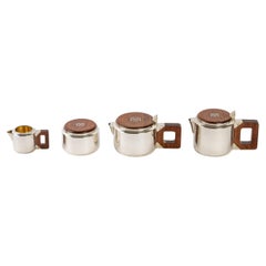 Ensemble moderniste Jean Puiforcat Tea Coffee Egoiste de 1930 en argent sterling et bois de rose