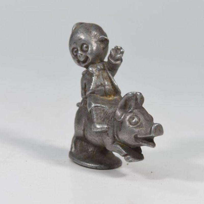 Jeannot child mascot on his pig radiator cap 1930 aluminum dimension length 9 cm by 3 cm. Bertin's model

Additional information:
Material: Cast iron (iron, aluminum).
