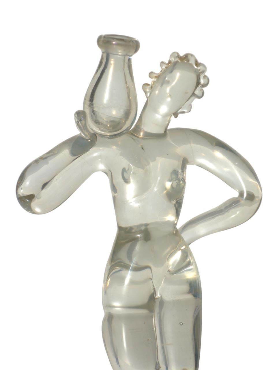 Napoleon Martinuzzi
CVM
Venedig 1930

Akt einer Frau mit Amphore
Leicht schillerndes Glas mit goldgesprenkeltem Einschluss
Seltene Glasskulptur

Innengewinde auf der Rückseite der Figur (siehe Foto)
Keine Restaurierung
Original 30er Jahre