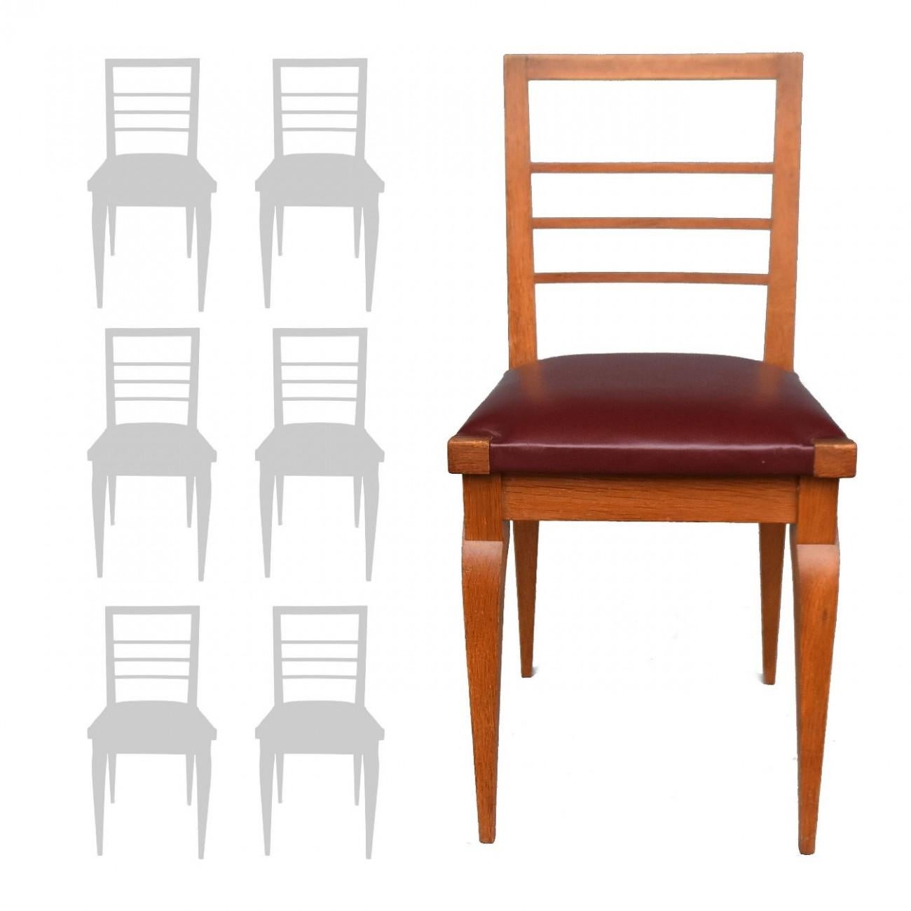 Series of 6 oak chairs burgundy leather top 1930 by Auguste Vallin height dimension 85 cm and a width of 41 cm and depth of 43 cm. From the estate of Auguste Vallin in Marseille, Auguste Vallin architect and designer son Eugene Vallin.