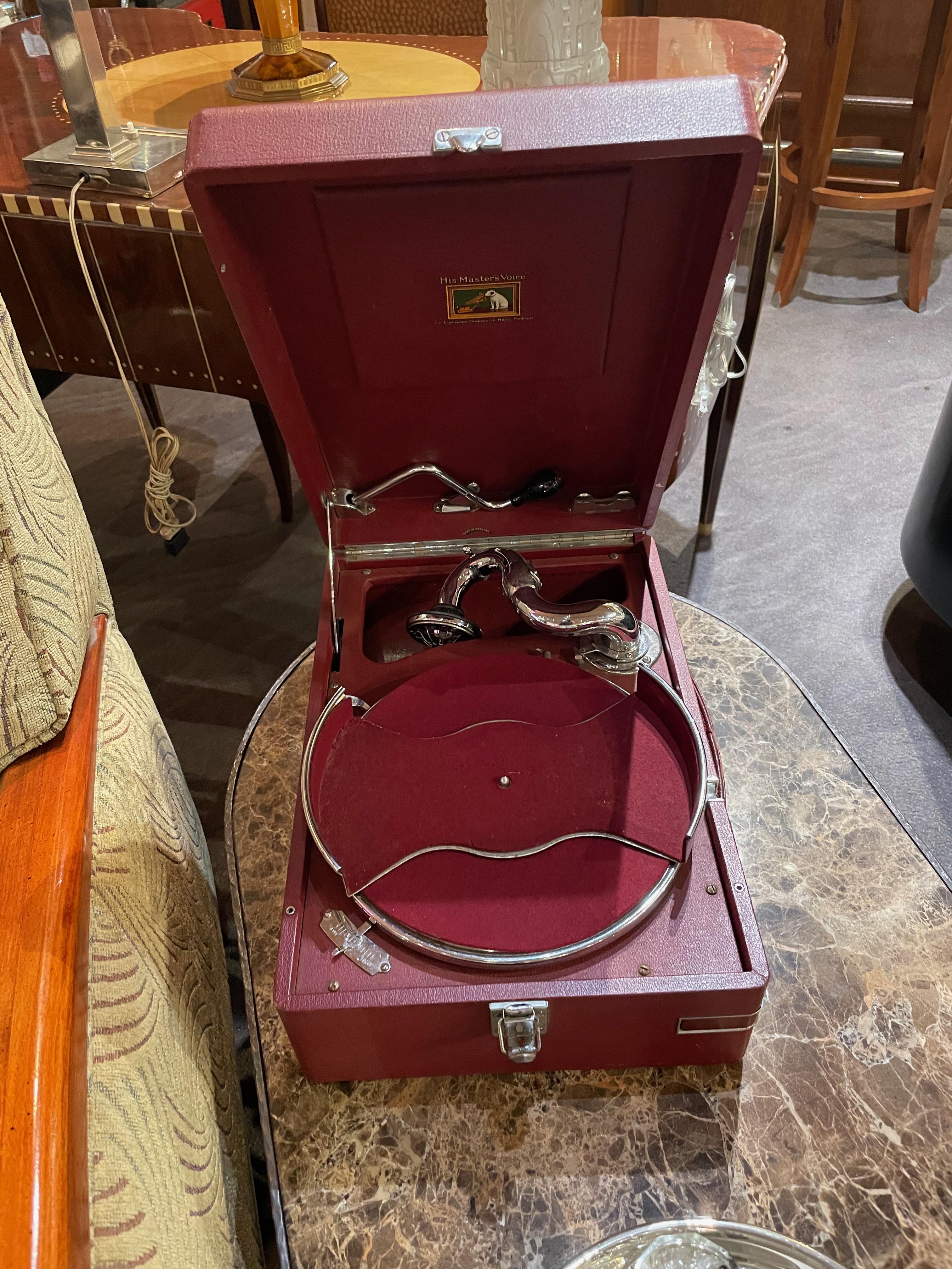 1930 Portable Gramophone His Master’s Voice Original Red Covered Finish. This 1930 Portable Gramophone is the real deal. It’s an HMV Model 101, part of a small collection of such classic sound machines which have been restored. This has an unusual