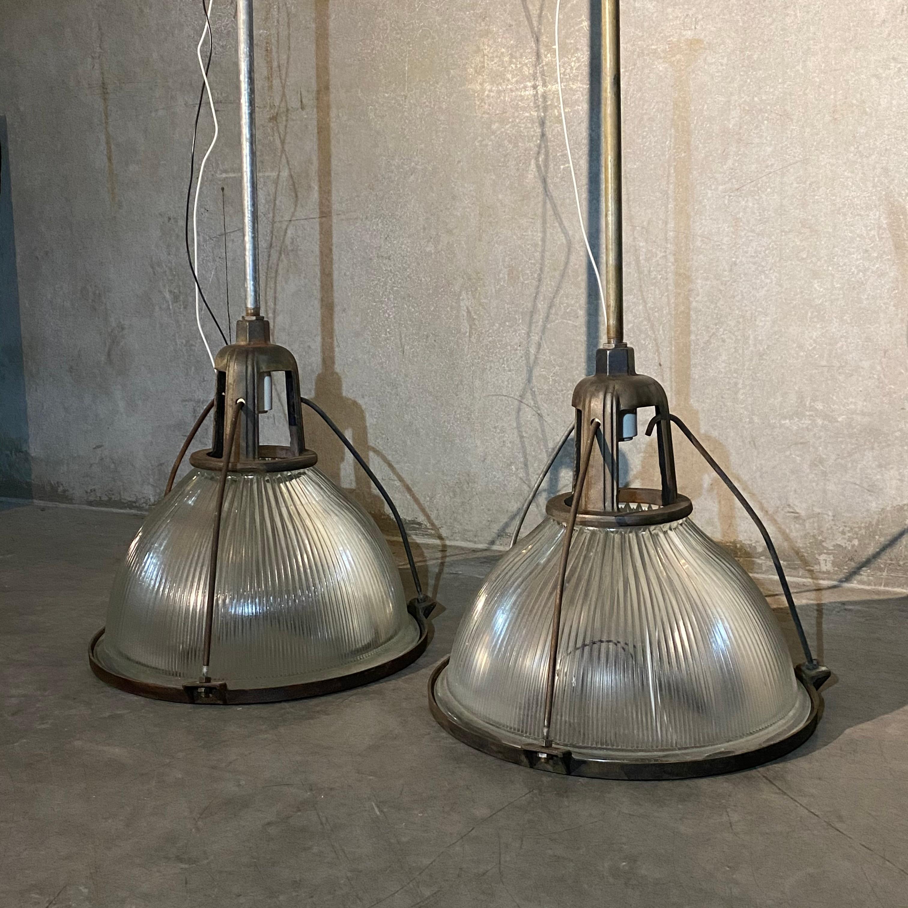 A rare group of three large Holophane lights with first generation cast fitters, ribbed and extra large glass, not many of these out there.

price per light ..

Rewired on pipe with ability to determine height easily.
Set up for easy install.