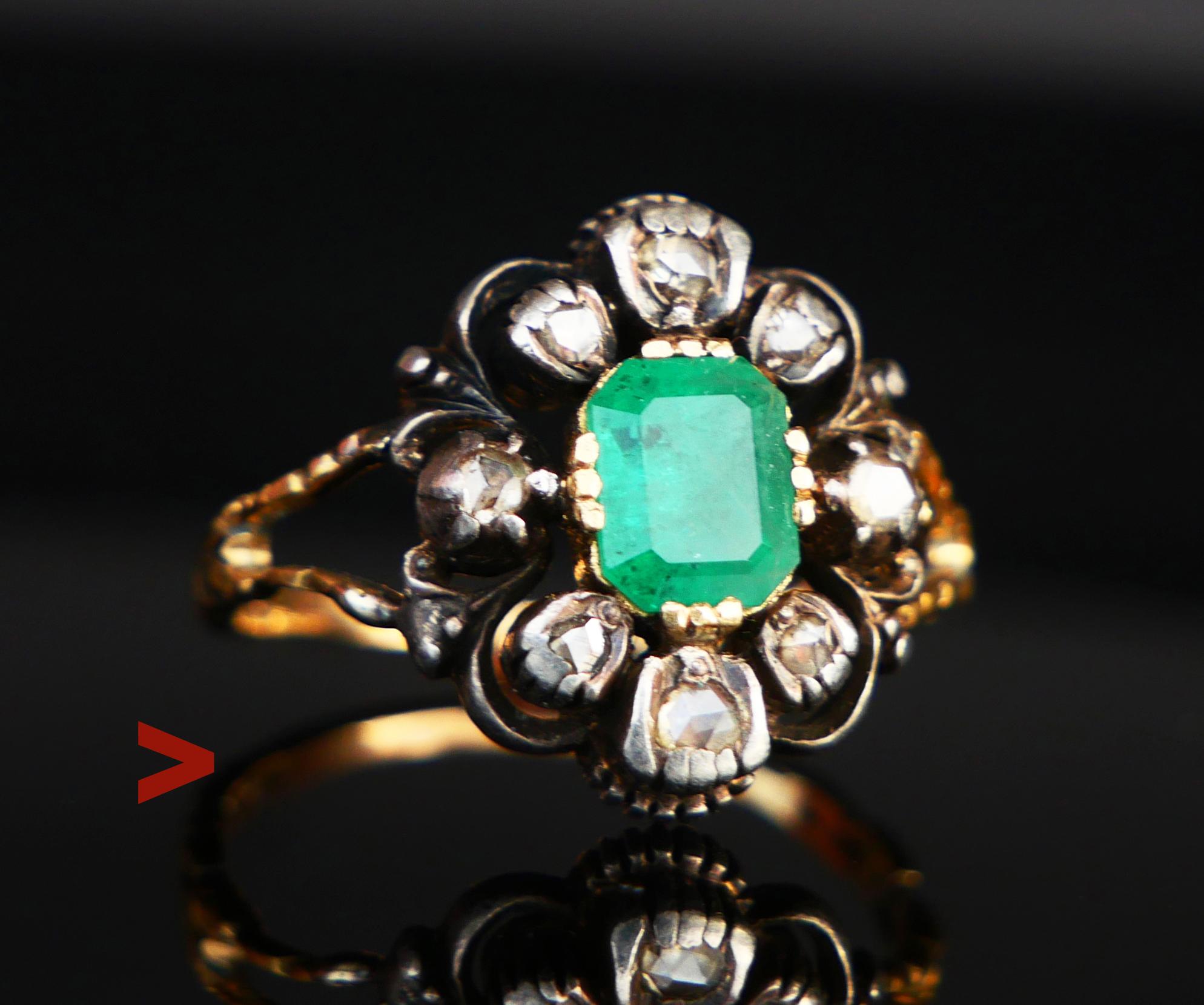 Nice Renaissance - styled cluster Ring with the carved band, shoulders, and parts of the crown in solid 18ct Yellow Gold holding natural Emerald stone and eight rose - cut Diamonds set in Silver clusters.

Crown  17 mm x 15 mm x 5.5 mm deep

Natural