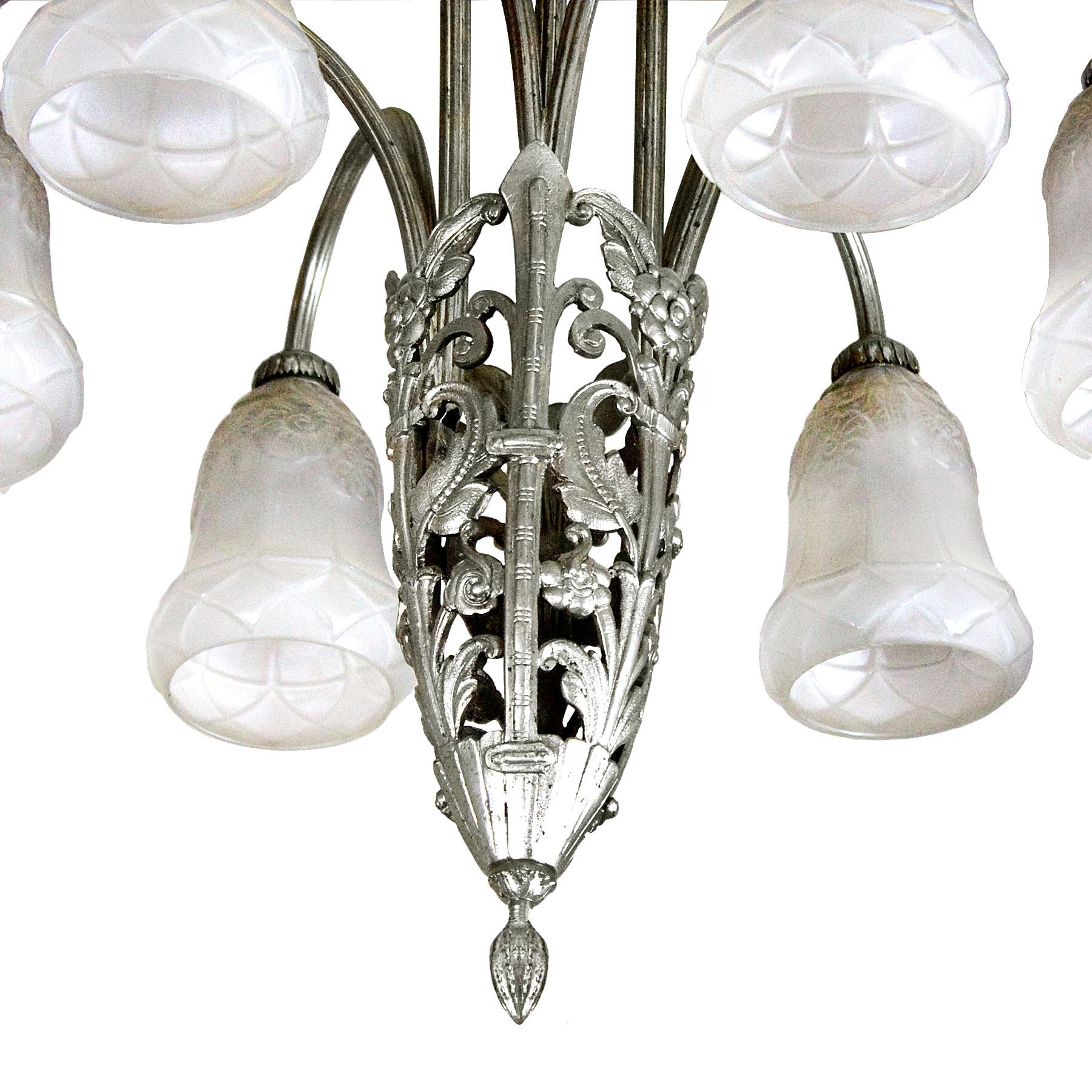 Six-branch Art Deco chandelier, silvered bronze and pressed glass.

France, circa 1930.