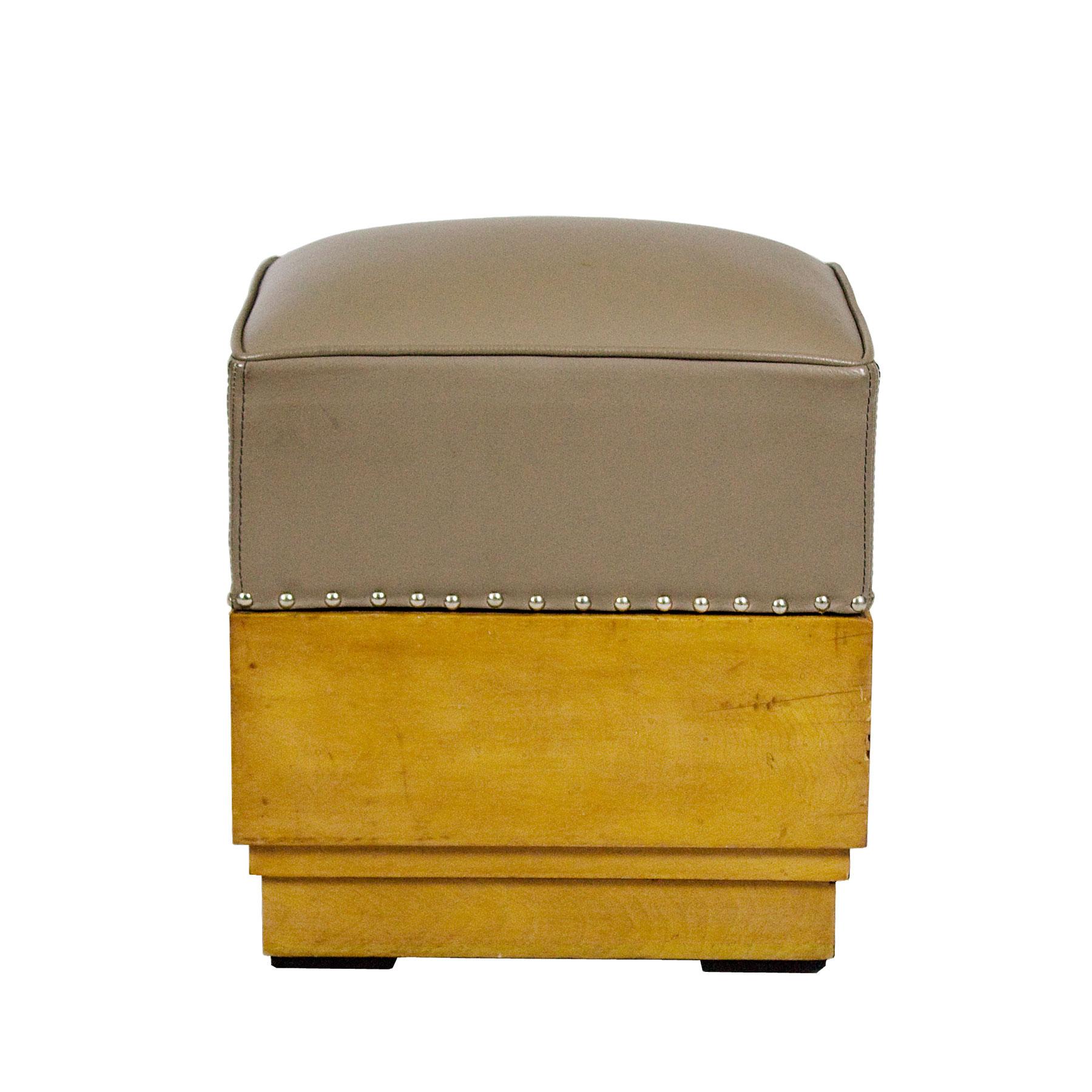 Cubist Art Deco pouffe in maple and taupe leather upholstery.

Spain, Barcelona circa 1930.
