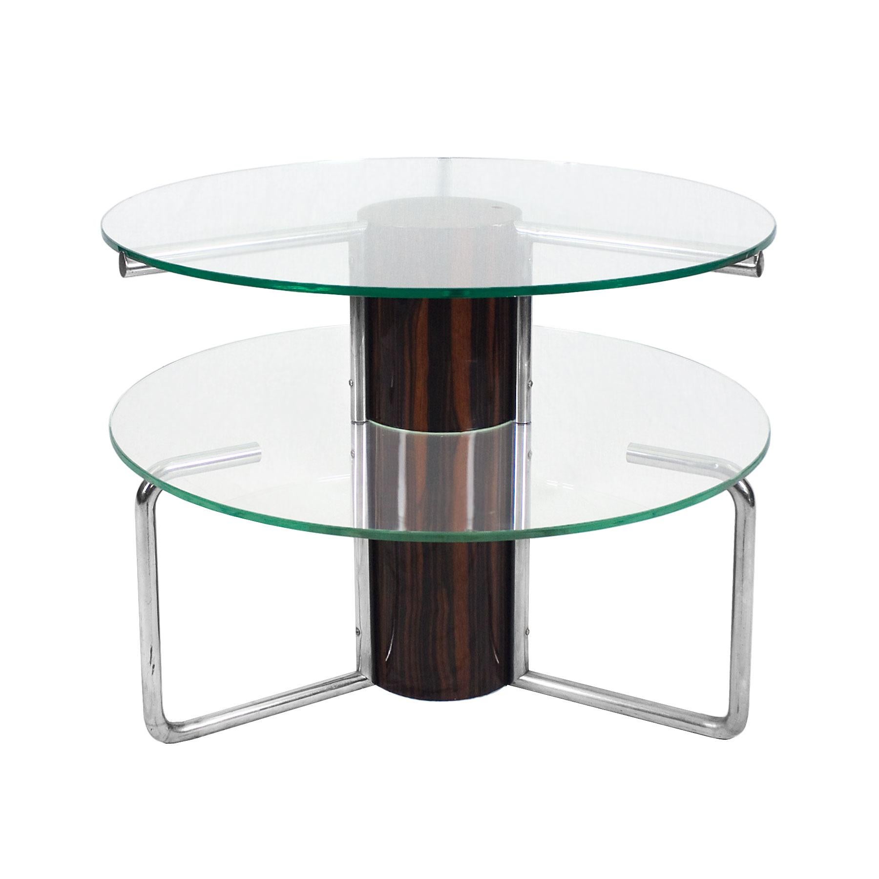 Large center table with a central stand in solid wood with French polished Macassar ebony veneer, and six screwed chrome-plated tubes holding up the two thick original glasses plates.

Italy, circa 1930.