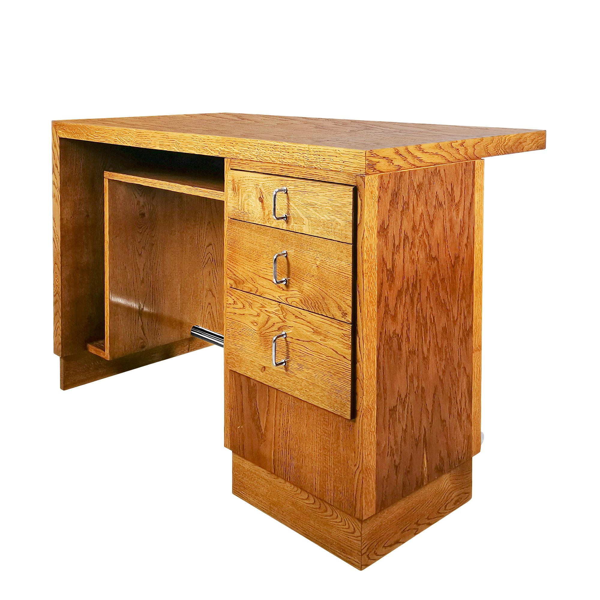 Small Art Deco cubist and double sided desk, solid oak and oak plywood, French polish. Three drawers and a shelve under the top, nickel plated steel tube and handles.
In the style of Francisque Chaleyssin. 

France, Lyon c. 1930.