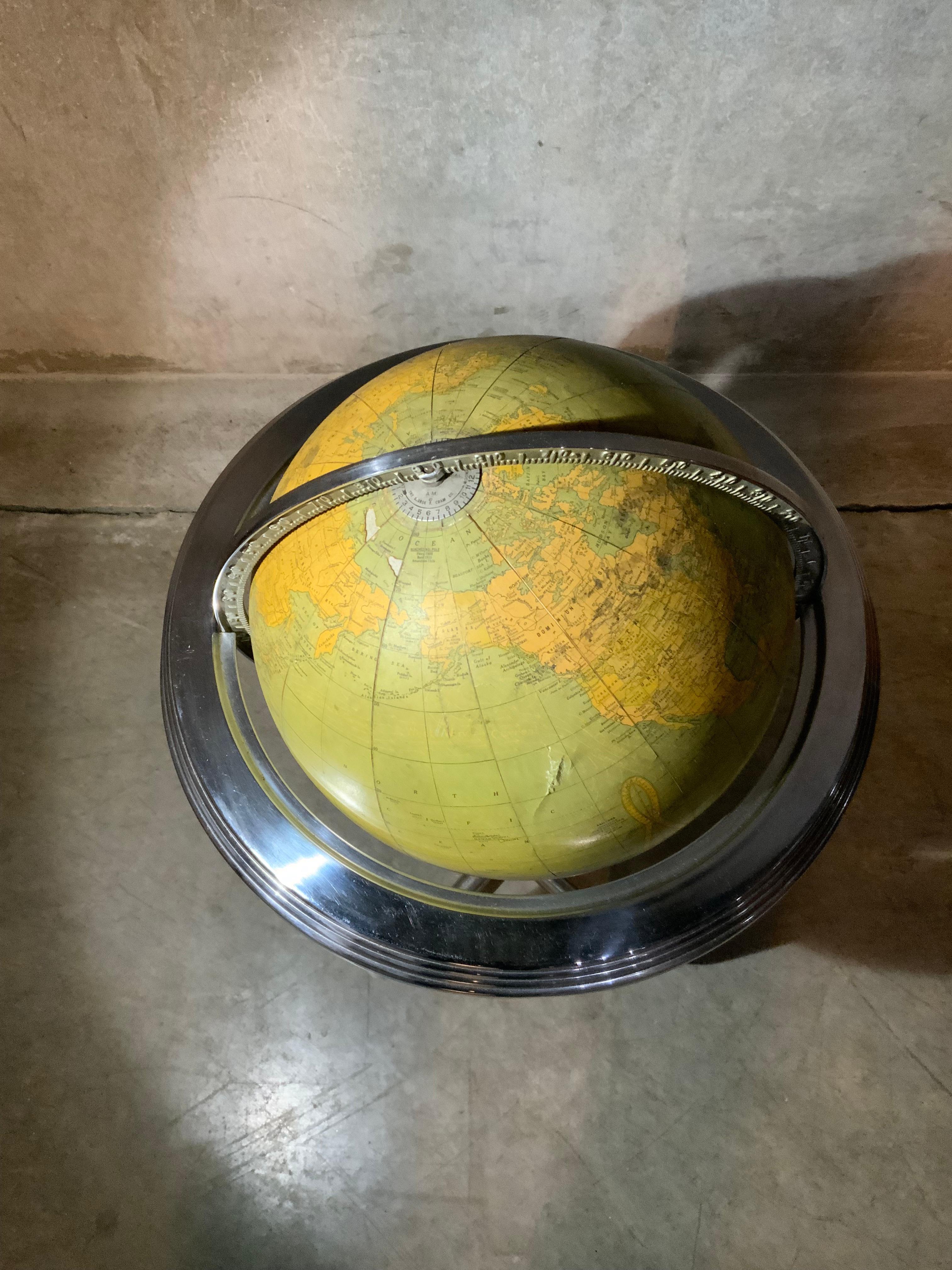 Extremely rare world globe on floor stand in the deco manner, fully functional with nickel finish. Manufactured by Cram who started making globes 135 years ago. This is the only one i've seen with original metal base like this .



Acquired from