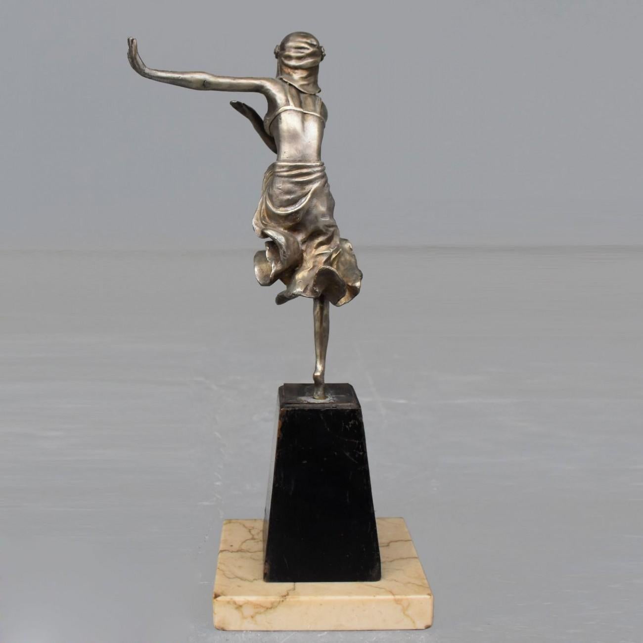 1930 young dancer Art Deco in silvered bronze with wooden pyramid blackened base.