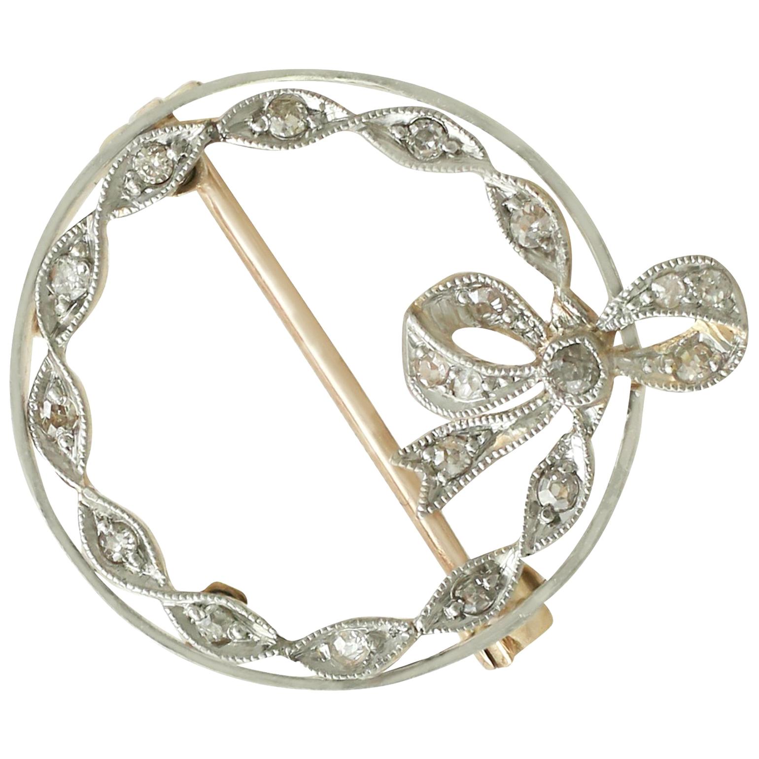 1930s Diamond Yellow Gold Platinum Set Bow Brooch For Sale