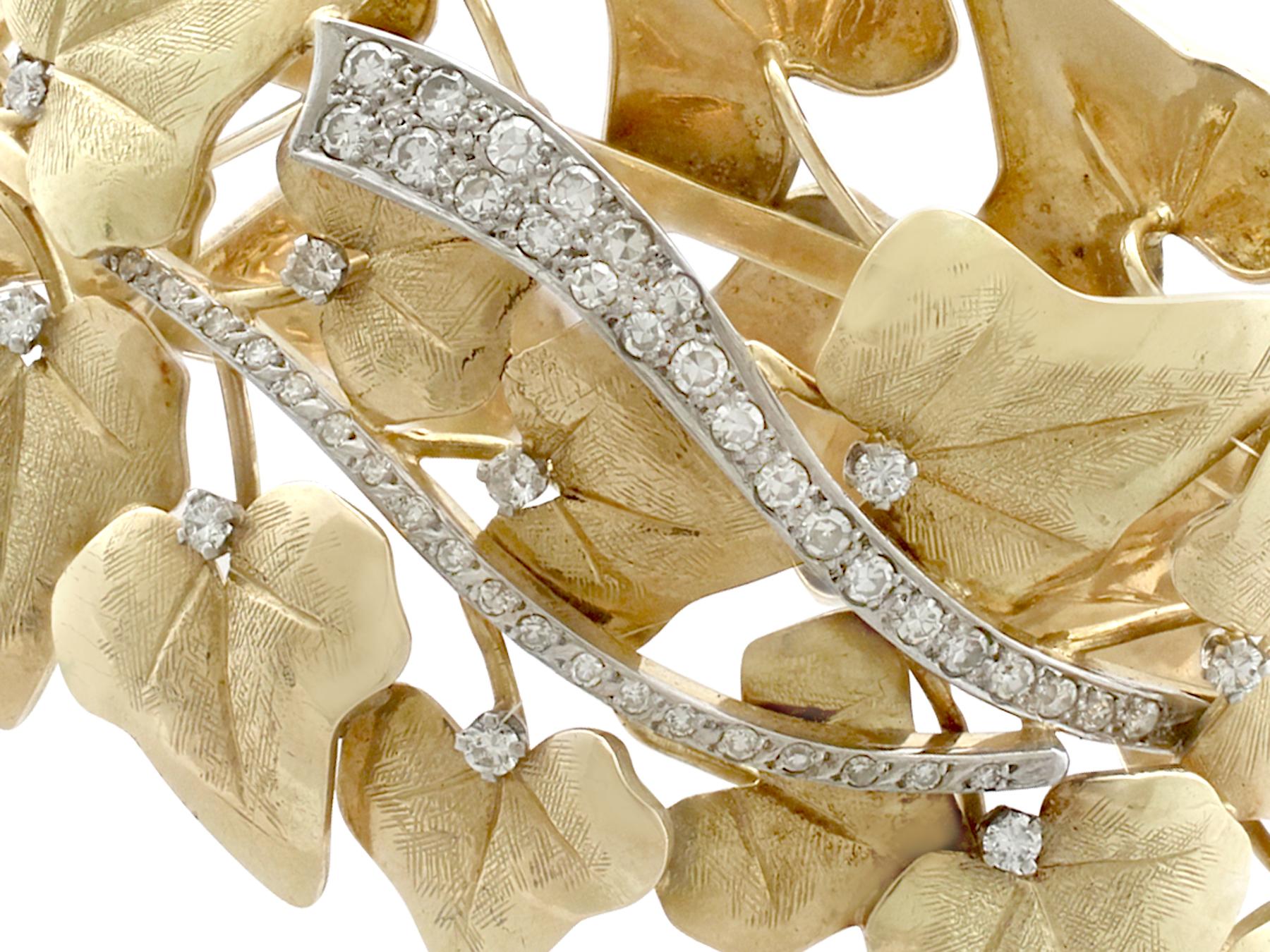 A stunning, fine and impressive 1.12 carat diamond and 18k yellow gold, 18 karat white gold set bangle; an addition to our antique jewelry and estate jewelry collections

This exceptional antique bangle with diamonds has been crafted in 18k yellow