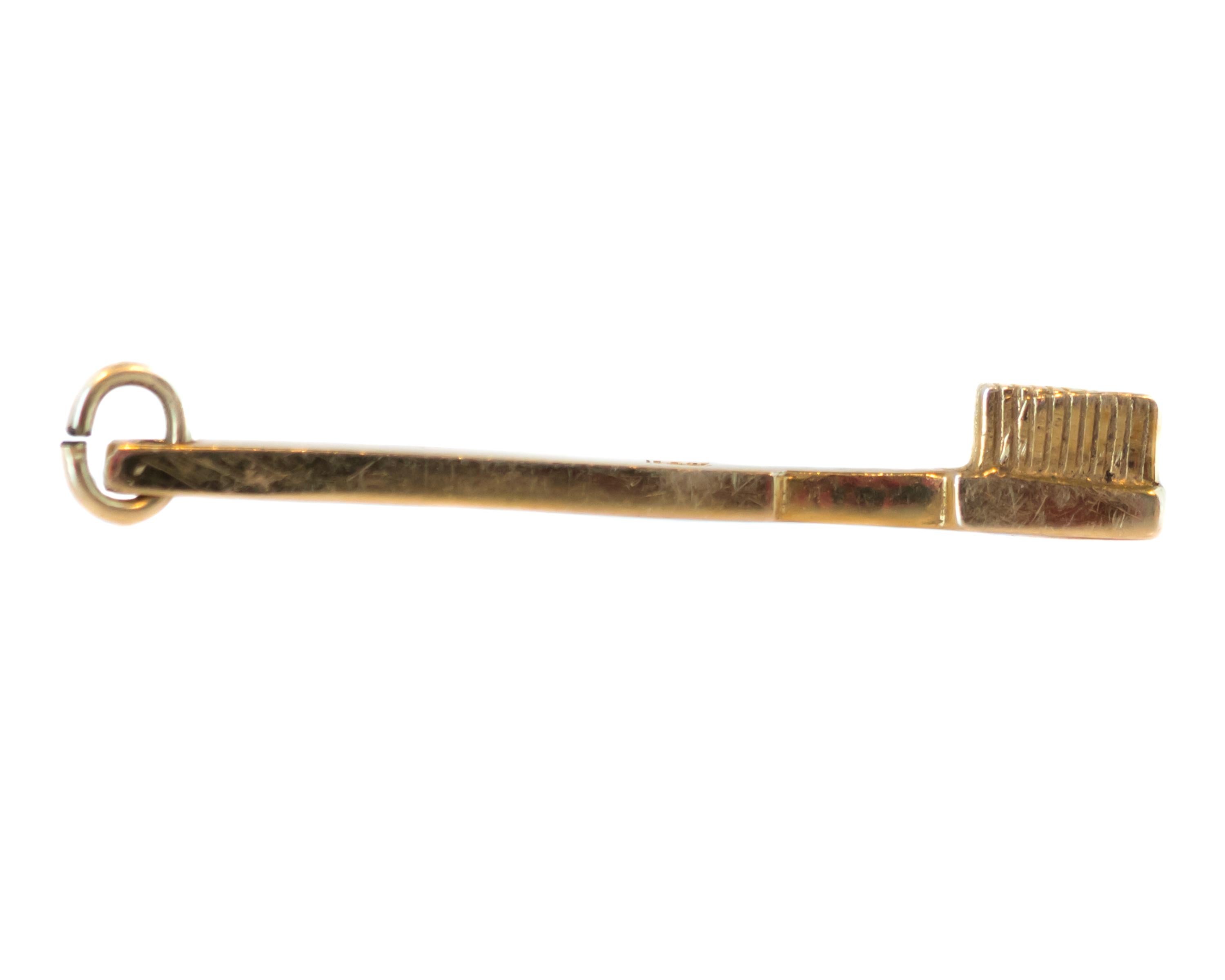1930s Toothbrush Charm - 14 Karat Yellow Gold

Features:
14 Karat Yellow Gold Solid Construction
Bristle Detail on Head
Long Handle with bail loop 
Shiny, Rich Gold

Toothbrush measures 32 x 2.5 millimeters

Charm Details:
Metal: 14 Karat Yellow