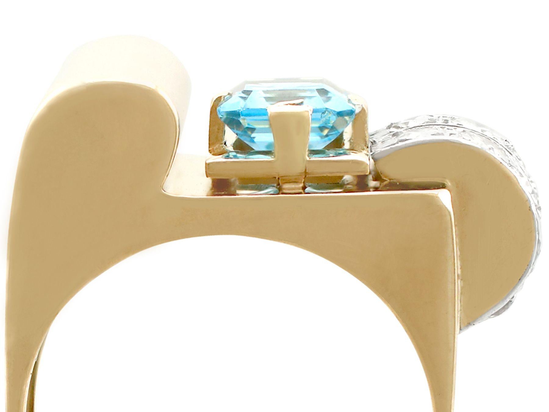 A stunning, fine and impressive antique 1.45 carat natural aquamarine and 0.30 carat diamond, 18 karat yellow gold, 18 karat white gold set dress ring in the Art Deco style; part of our antique jewelry/estate jewelry collections

This stunning