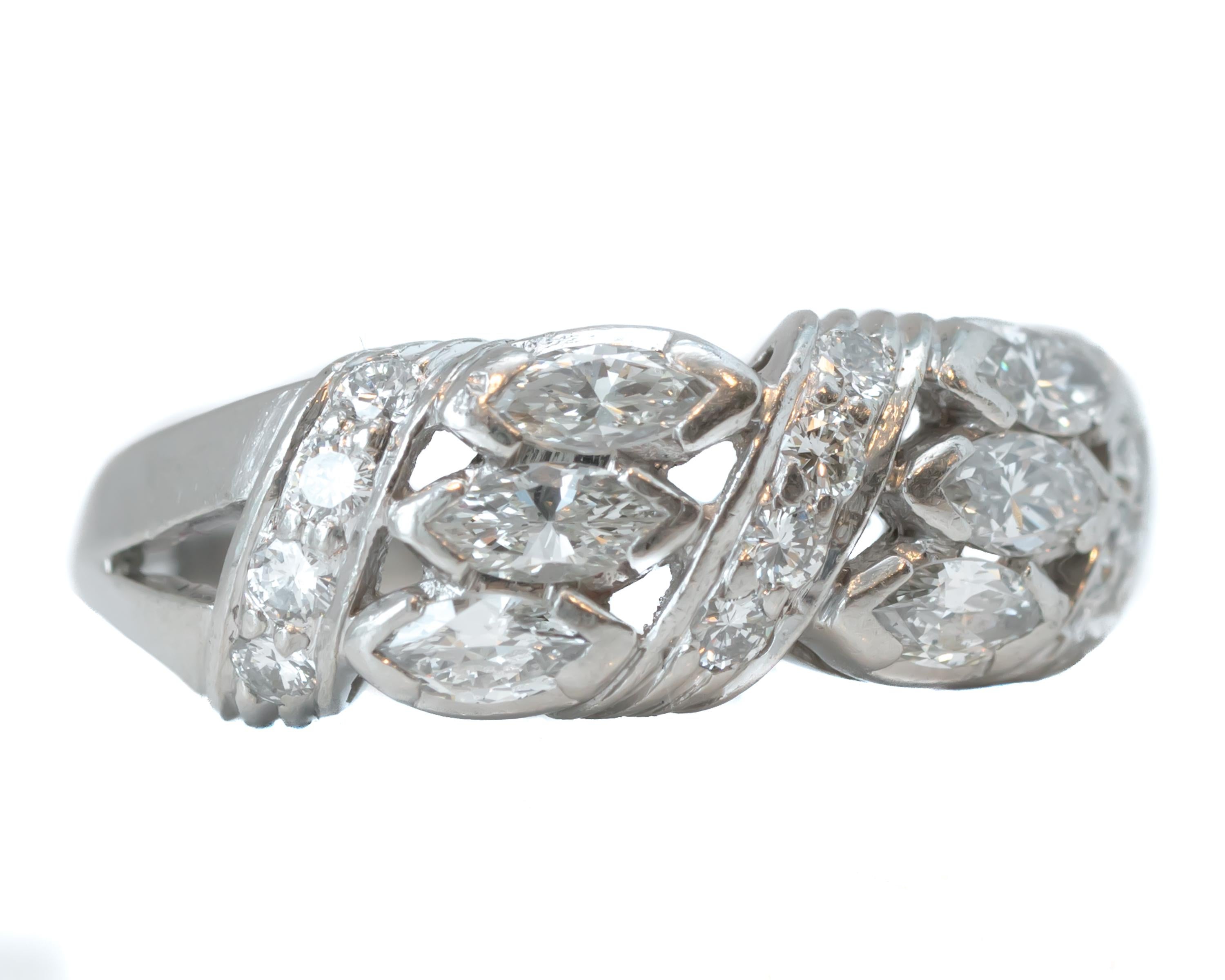 1930s Art Deco Diamond Band Ring crafted in Platinum

Features:
1.5 carat total Marquise and Round cut Diamonds, all prong set
Platinum Crafted setting

Band tapers from 8 - 2.5 millimeters
Finger to top of stone measures 4 millimeters
Ring fits