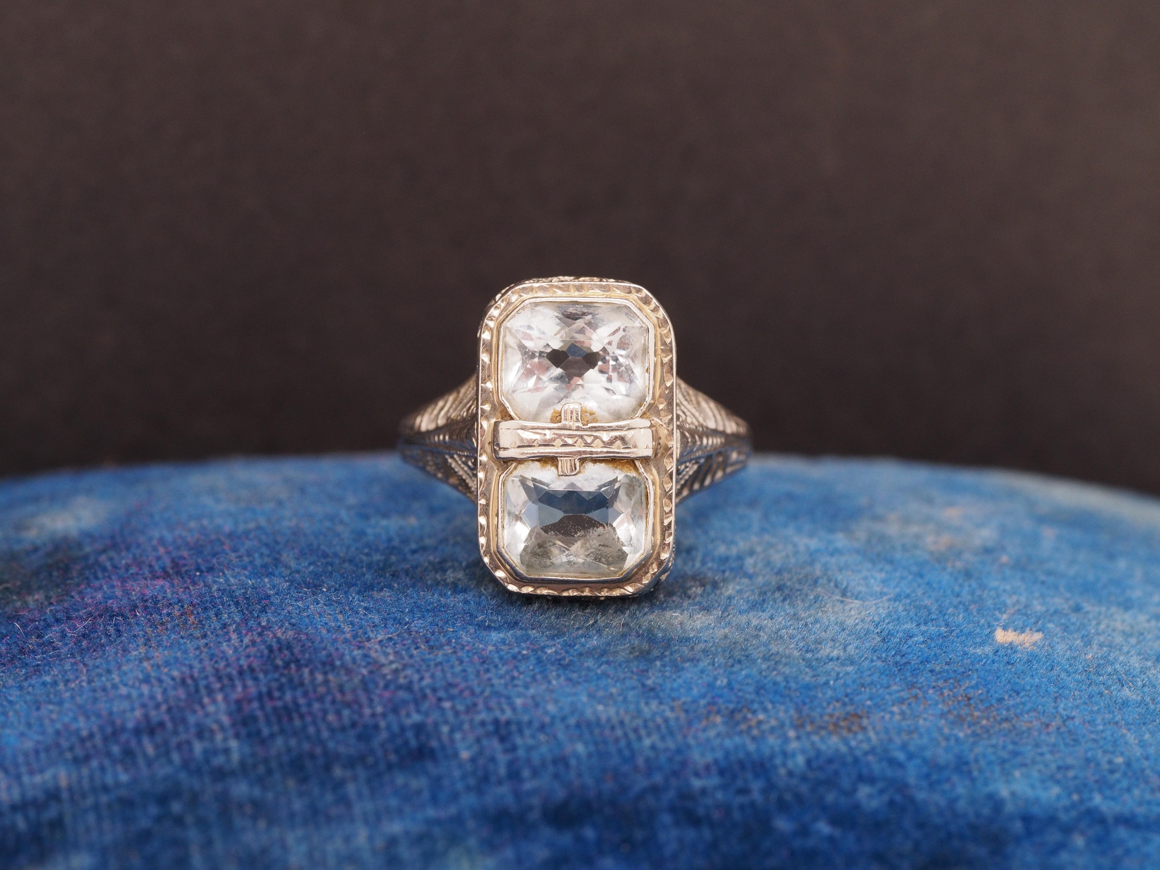 Year: 1930s
Item Details:
Ring Size: 6.5
Metal Type: 18K White Gold [Hallmarked, and Tested]
Weight: 3.2 grams
Aquamarine Details: 2 Aquamarines, Natural, Light Blue, Rectangular Cut
Band Width: 2mm
Condition: Excellent
Price: 850
‌
This ring can be