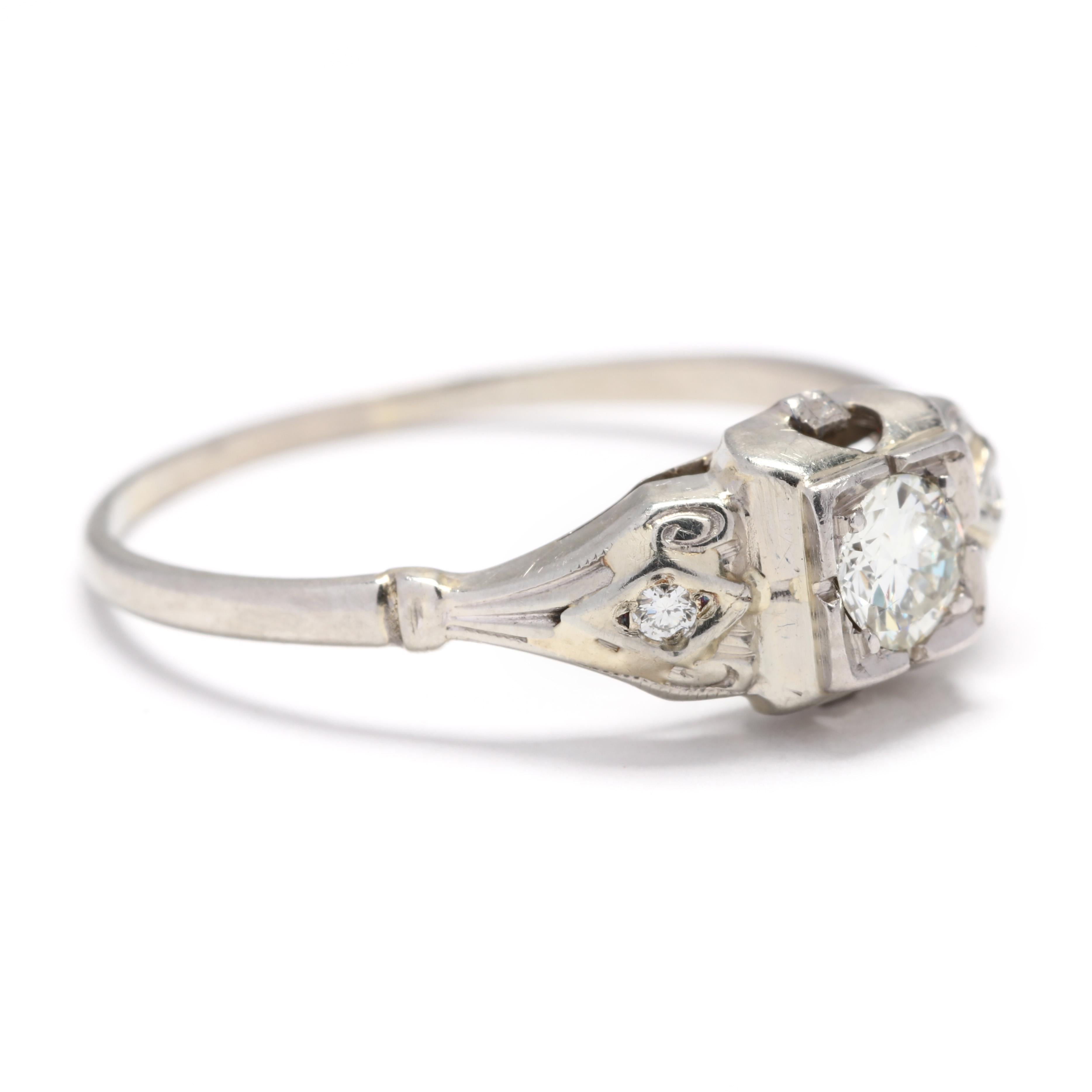 Art Deco 18 karat white gold old European cut diamond engagement ring. This ring features an old European cut center stone weighing approximately .25 carat set in a square surround with a tapered, engraved and diamond set shank.

Stones:
- diamonds,