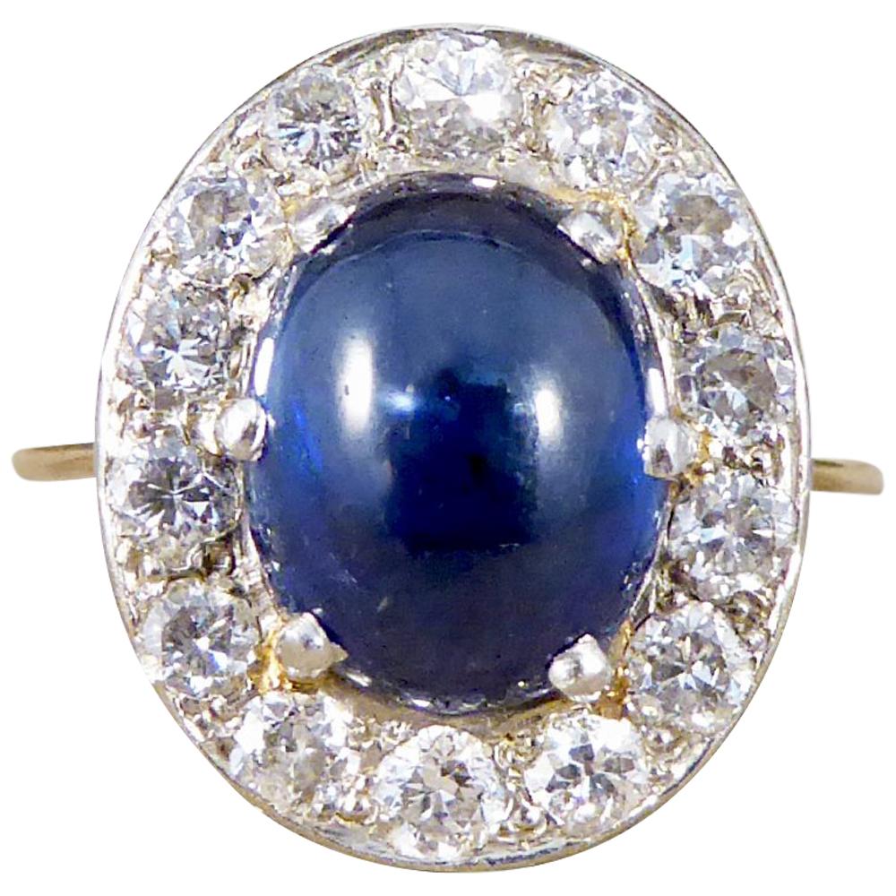 1930s 4 Carat Cabochon Sapphire and Diamond Cluster Ring in Unmarked 18Ct Gold