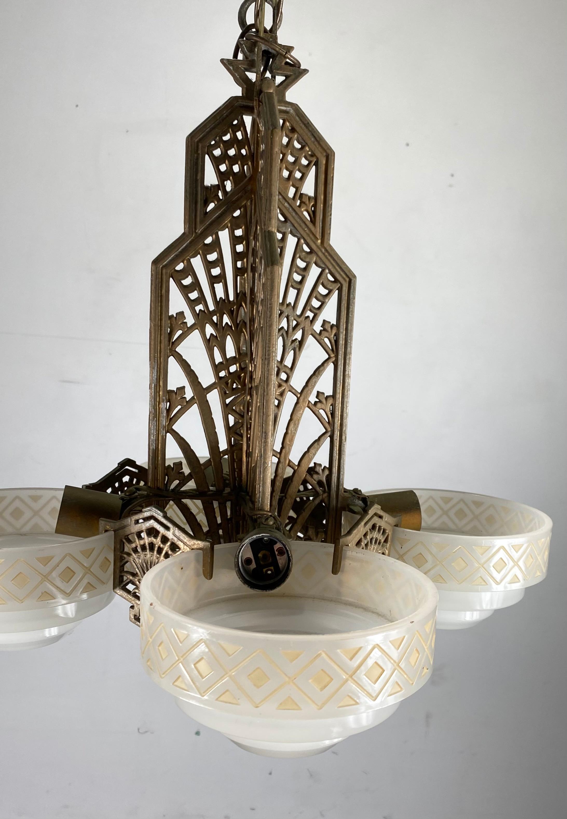 Cast 1930s 4-Shade Art Deco Hanging Pendant Chandelier, Stylized Metalwork by Markel