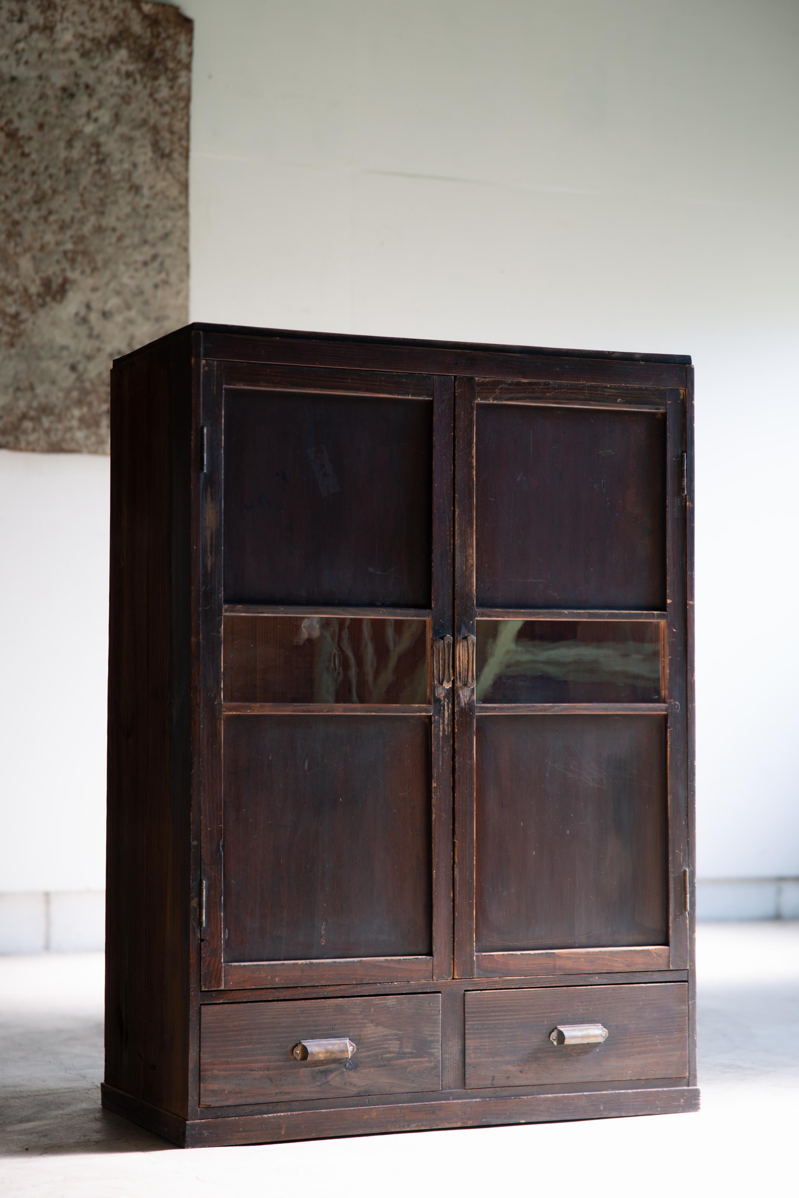 New finds from a Kominka in Ibaraki pref, Japan.

This mid-size wooden closet is a product of 1930s - 40s (early Showa period)  estimate from the style, conditions, also hearing from the familiy of former owner.
The antique wavy glasses remains in
