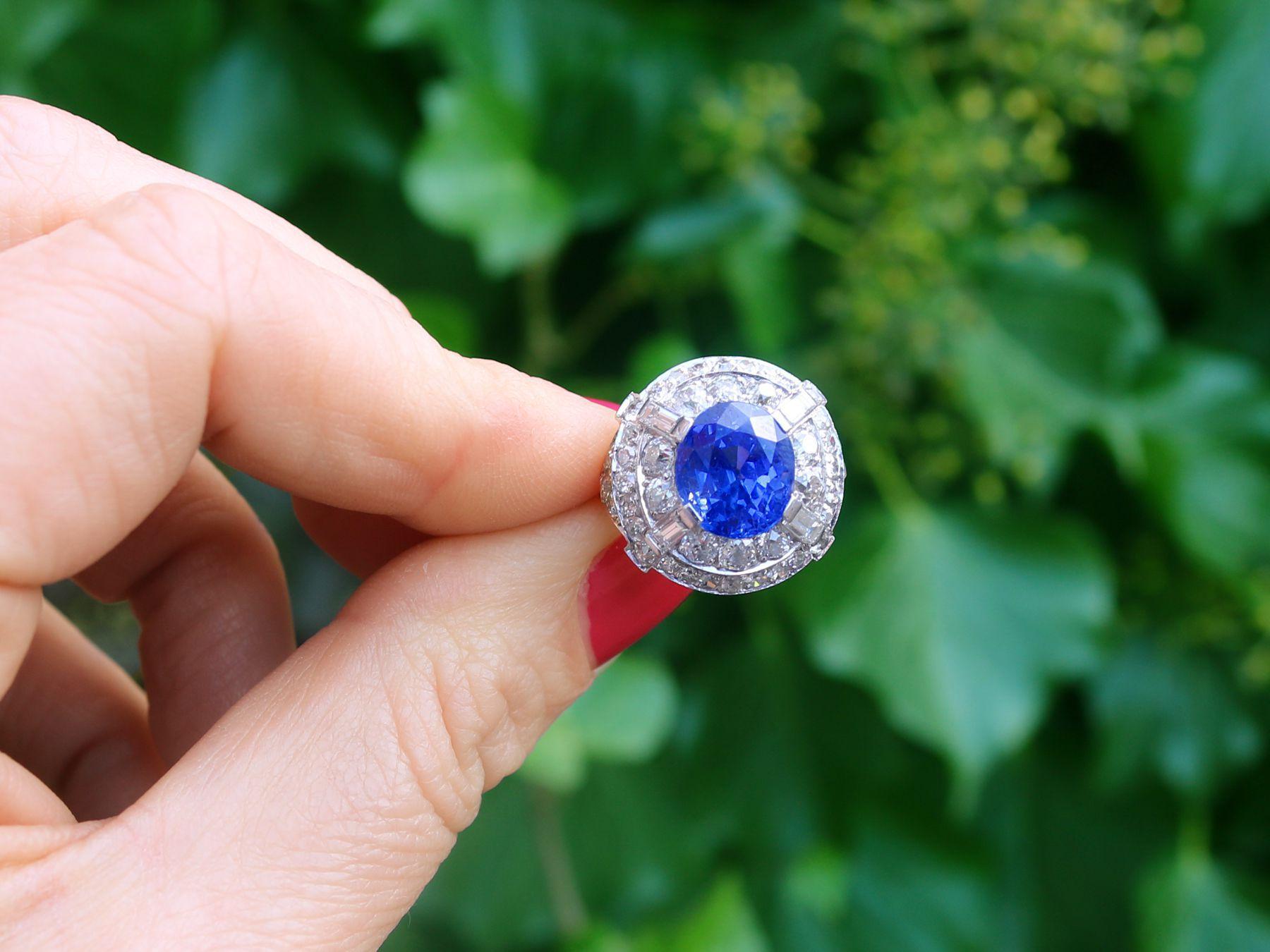 A stunning antique 8.80 Ceylon sapphire and 2.68 carat diamond, 18 karat white gold and platinum set cocktail ring; part of our diverse antique jewellery and estate jewelry collections.

This stunning, fine and impressive antique cocktail ring has