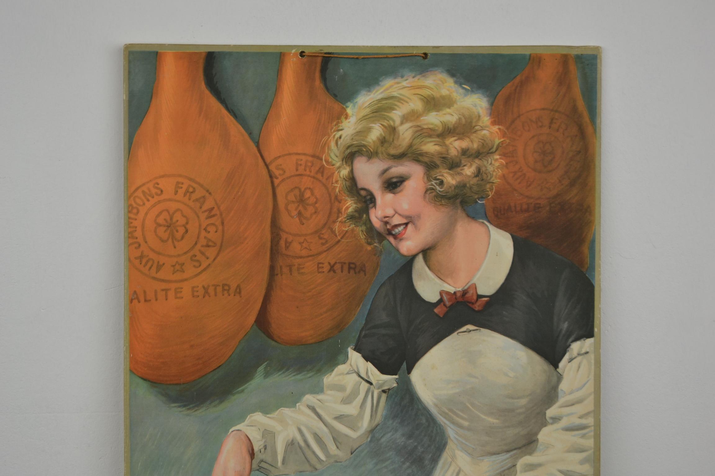 Antique lithographic advertising sign for French Ham designed by Millière Maurice.
This Art Deco sign dates from the 1930s.
A butchers wife, beautiful lady with red lipstick, cutting the ham into slices with a large butcher knife.
Behind, the