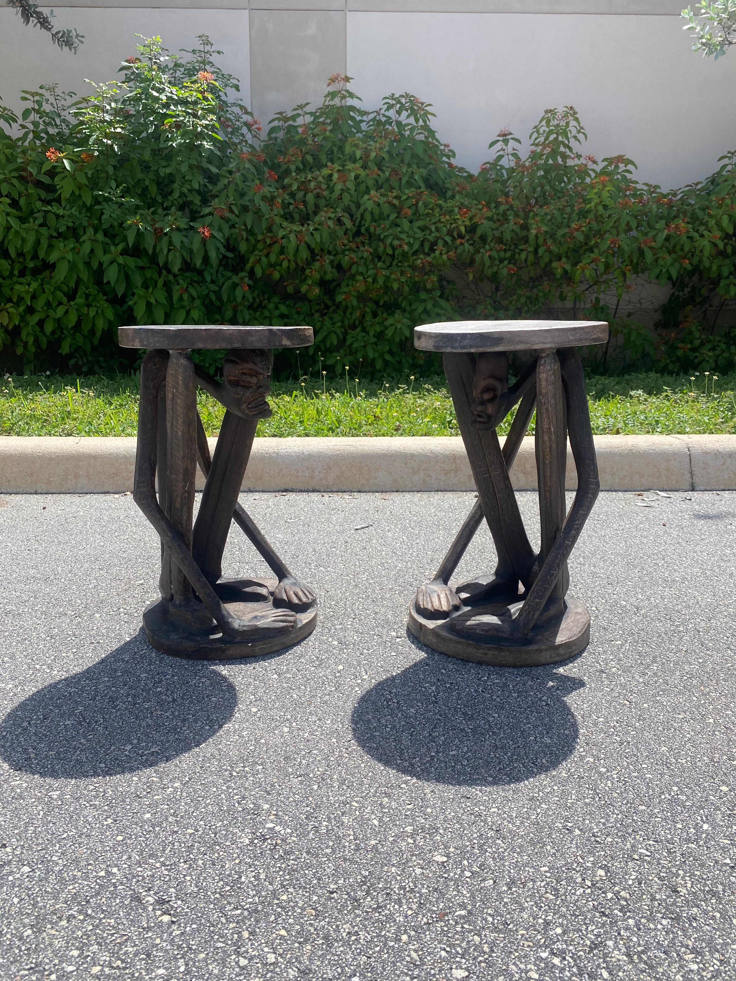 Arts and Crafts 1930s African Figurative Folk Art Carved Wood Stools Table, Set of 2 For Sale