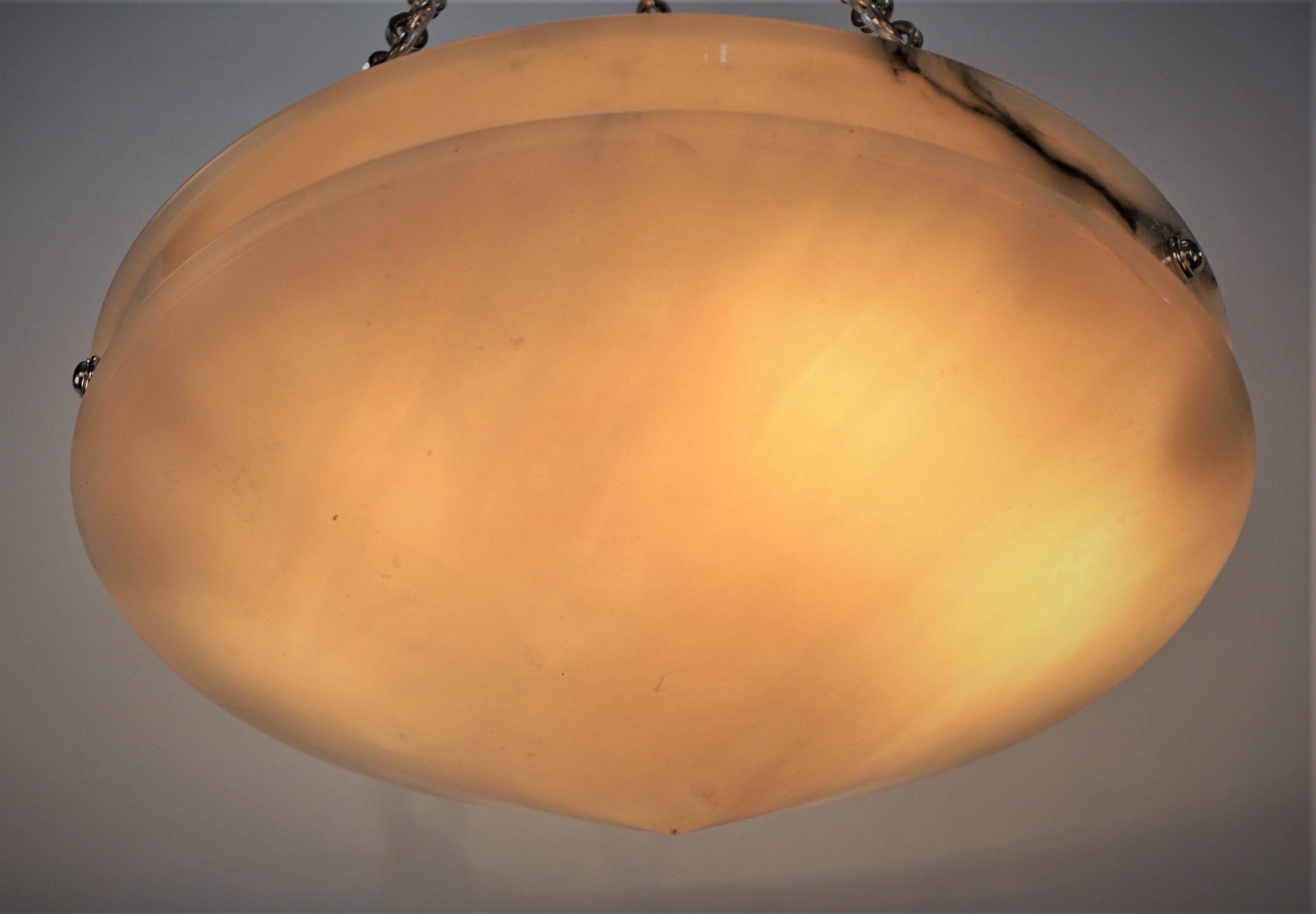 Simple but elegant alabaster chandelier with nickel on bronze chain and canopy.
Six lights, 75watts max each.