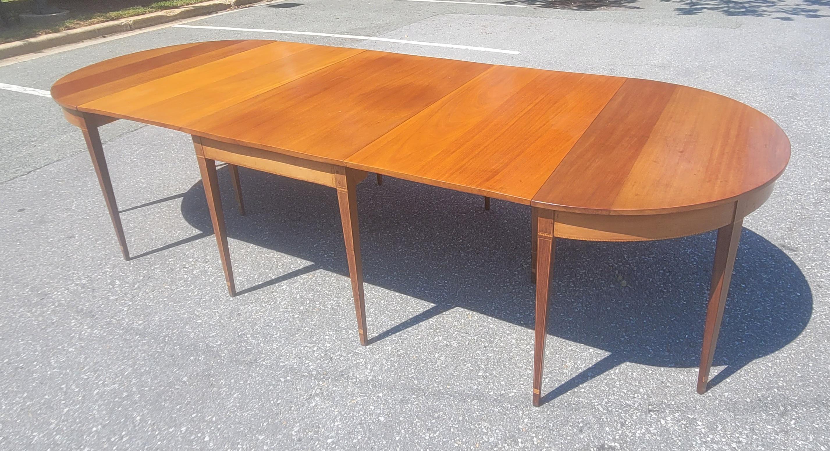 An amazing 1930s American Federal Inlaid Mahogany Three Part, 14 legs Banquet  Dining Table . Measures 126