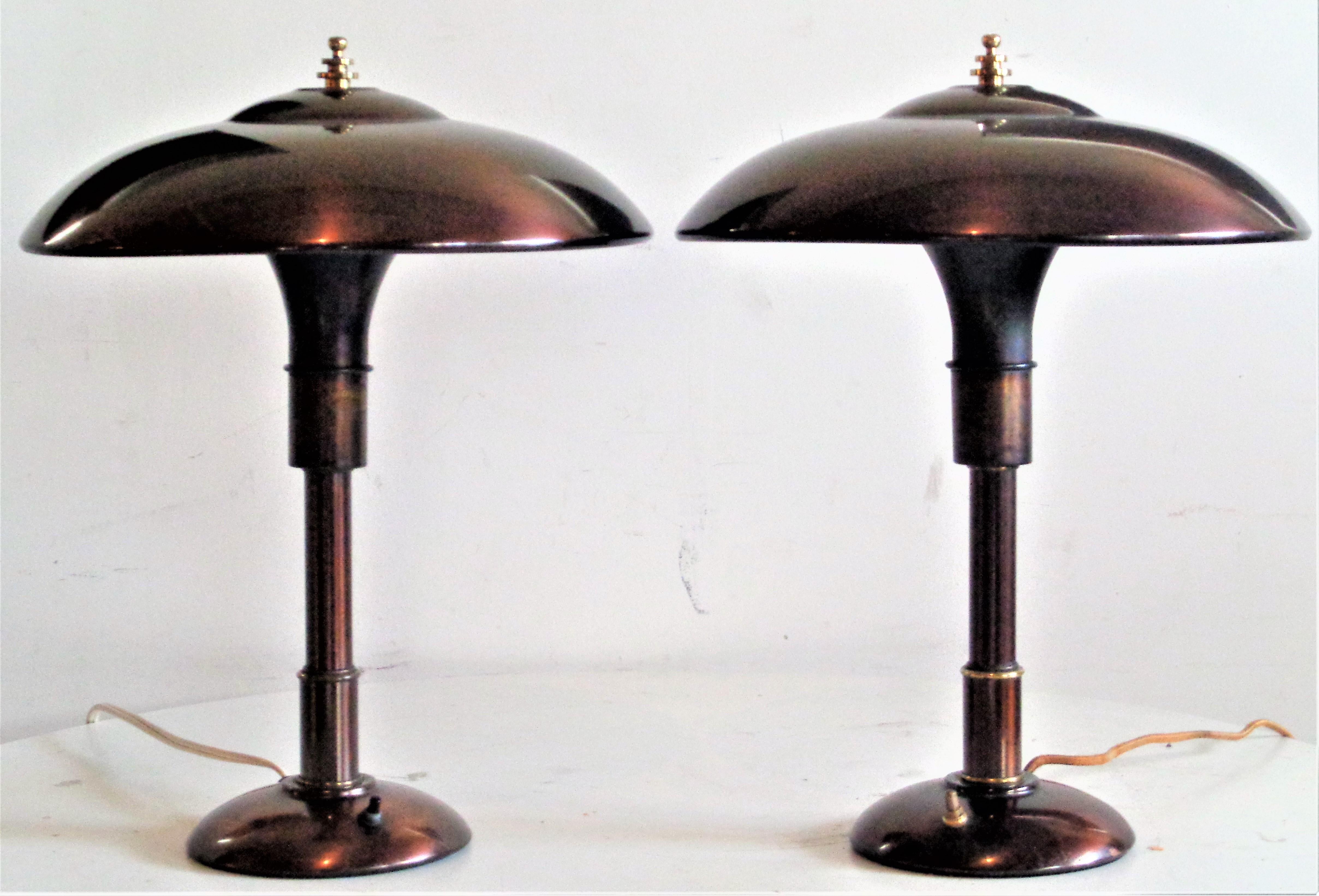 A pair of American machine age brass desk / table lamps 