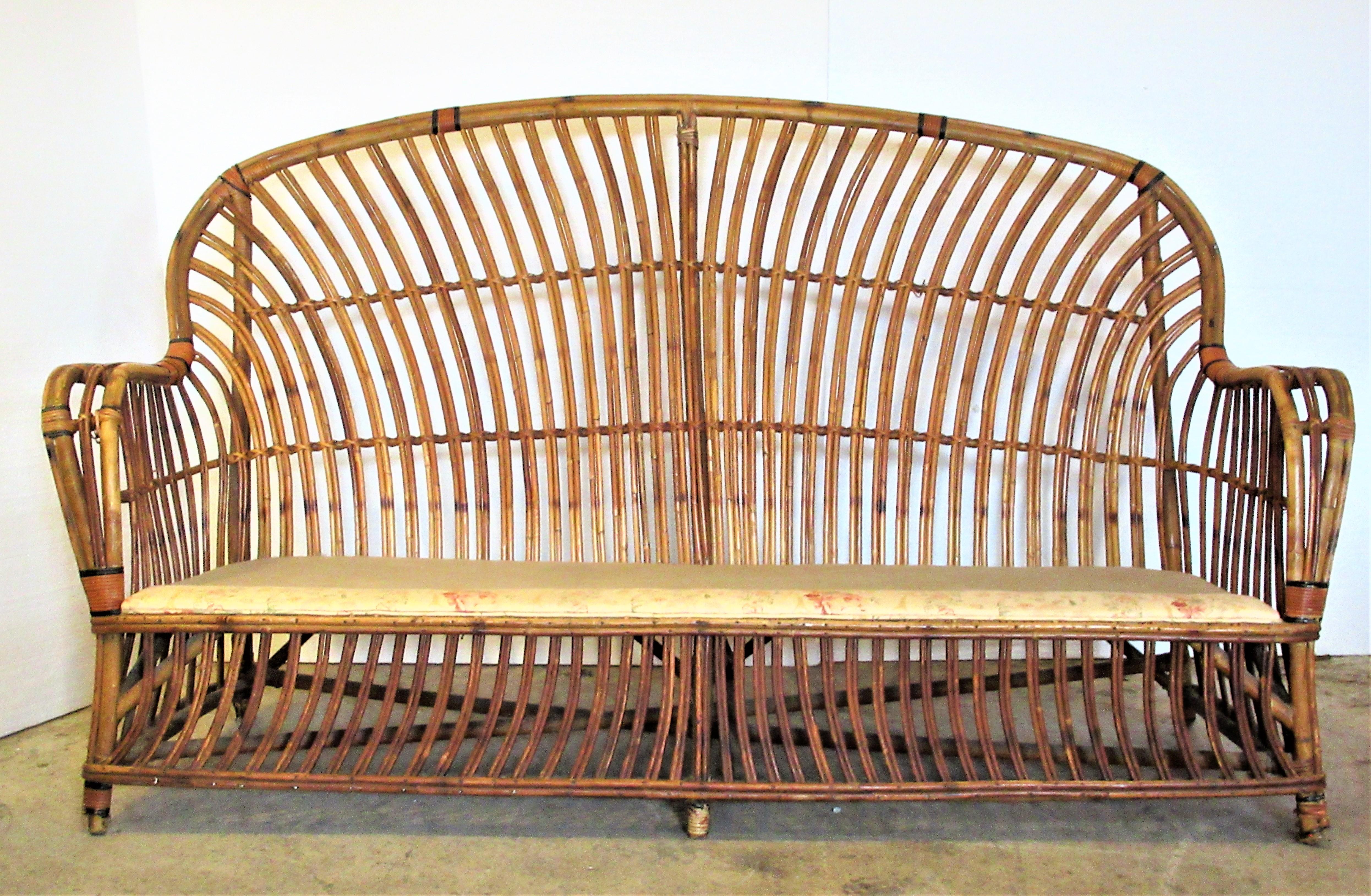 Antique stick wicker reed rattan sofa in original all-over beautifully aged glowing natural finish. American 1930s transitional Arts & Crafts - Art Deco design. Attributed to Heywood - Wakefield. Look at all pictures and read condition report in