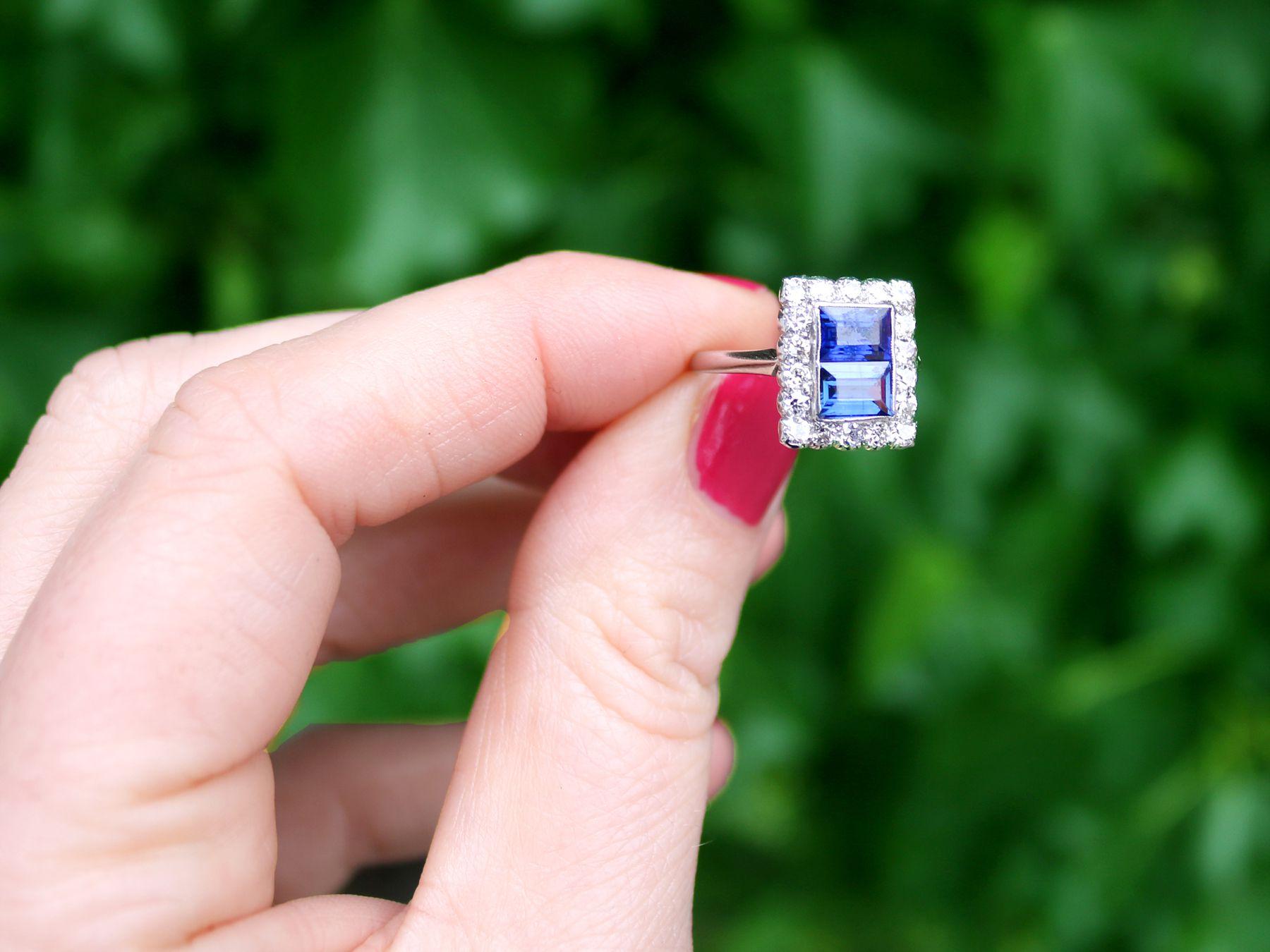 A stunning, fine and impressive antique 1.60 carat sapphire and 0.70 carat diamond, platinum cluster ring; part of our diverse antique jewellery and estate jewelry collections.

This stunning, fine and impressive 1930's sapphire and diamond ring has