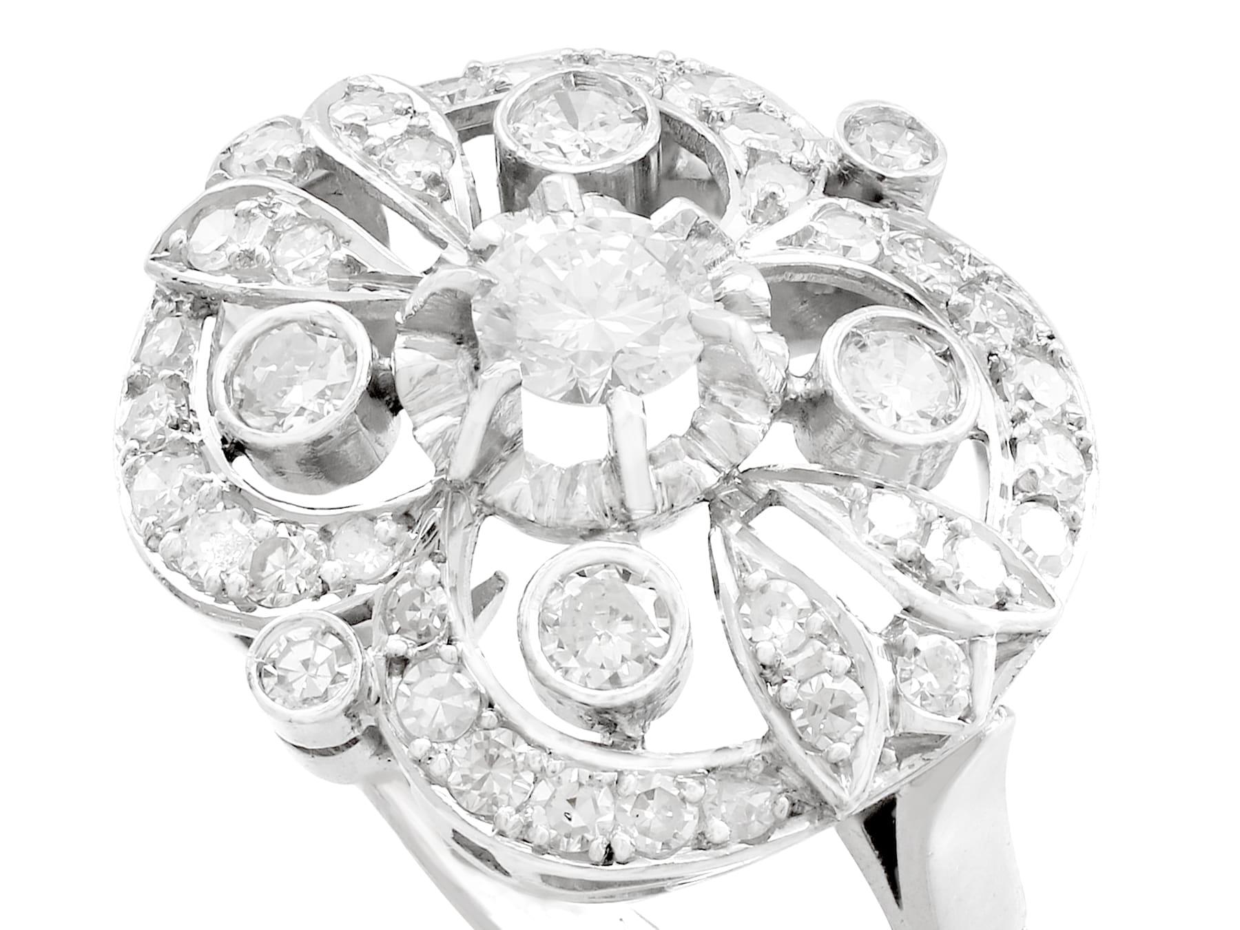 Art Deco Antique 1.68 Carat Diamond and White Gold Cluster Ring For Sale