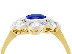 1930s Antique 1.70 Carat Sapphire and 2.10 Carat Diamond Gold Cluster Ring