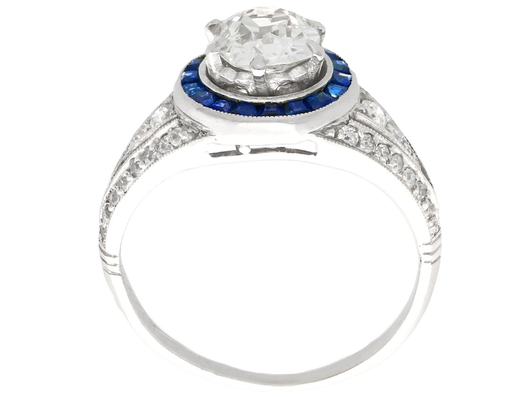 Women's or Men's 1930s Antique 2.59 Carat Diamond and Sapphire Platinum Cocktail Ring For Sale