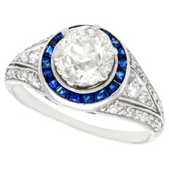 1930s Antique 2.59 Carat Diamond and Sapphire Platinum Cocktail Ring