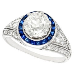 1930s Antique 2.59 Carat Diamond and Sapphire Platinum Cocktail Ring